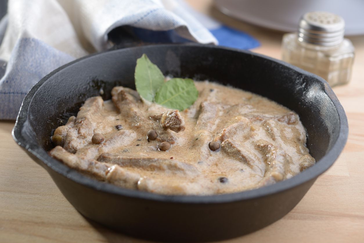 Beef Stroganoff in a cast-iron pan
