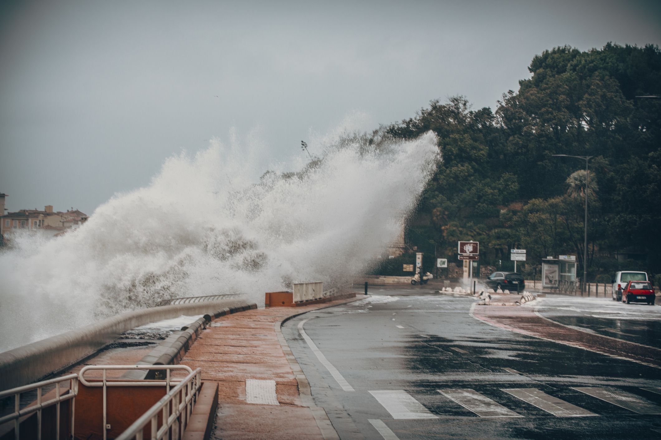 Marseille Corniche Kennedy big waves splash against road and cars