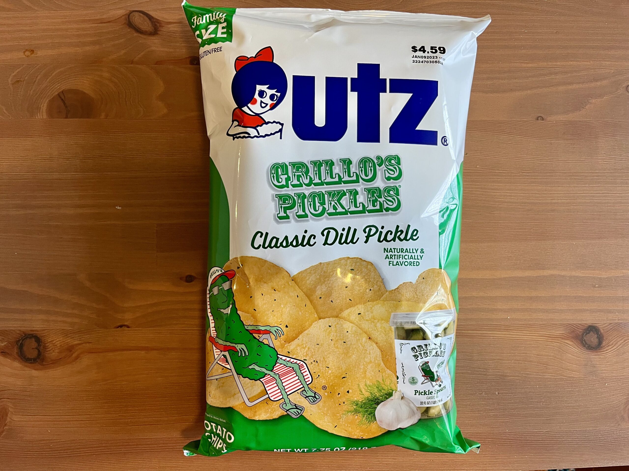 a bag of utz chips grillos dill pickles
