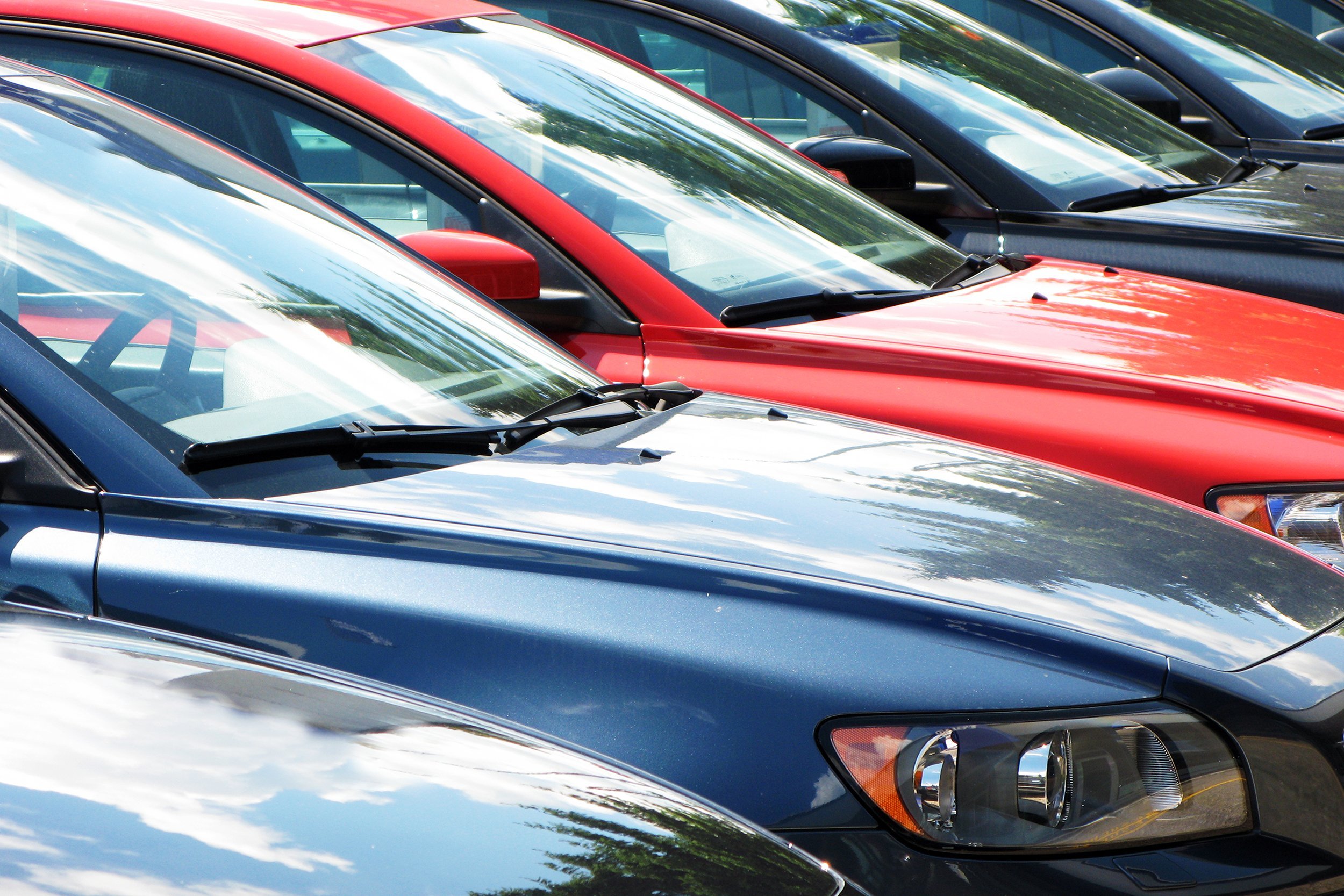 cars parked at car dealership