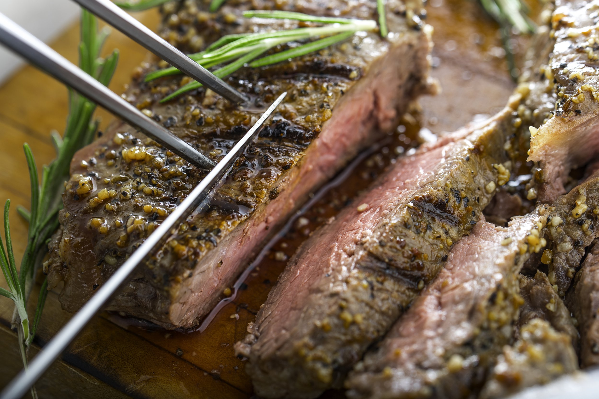Slicing into a juicy steak