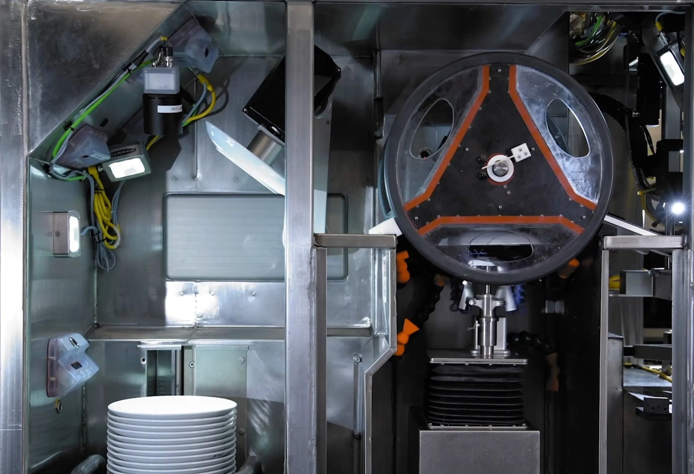 Dishcraft Robotics System cleaning each individual dish using a rotating scrubber head