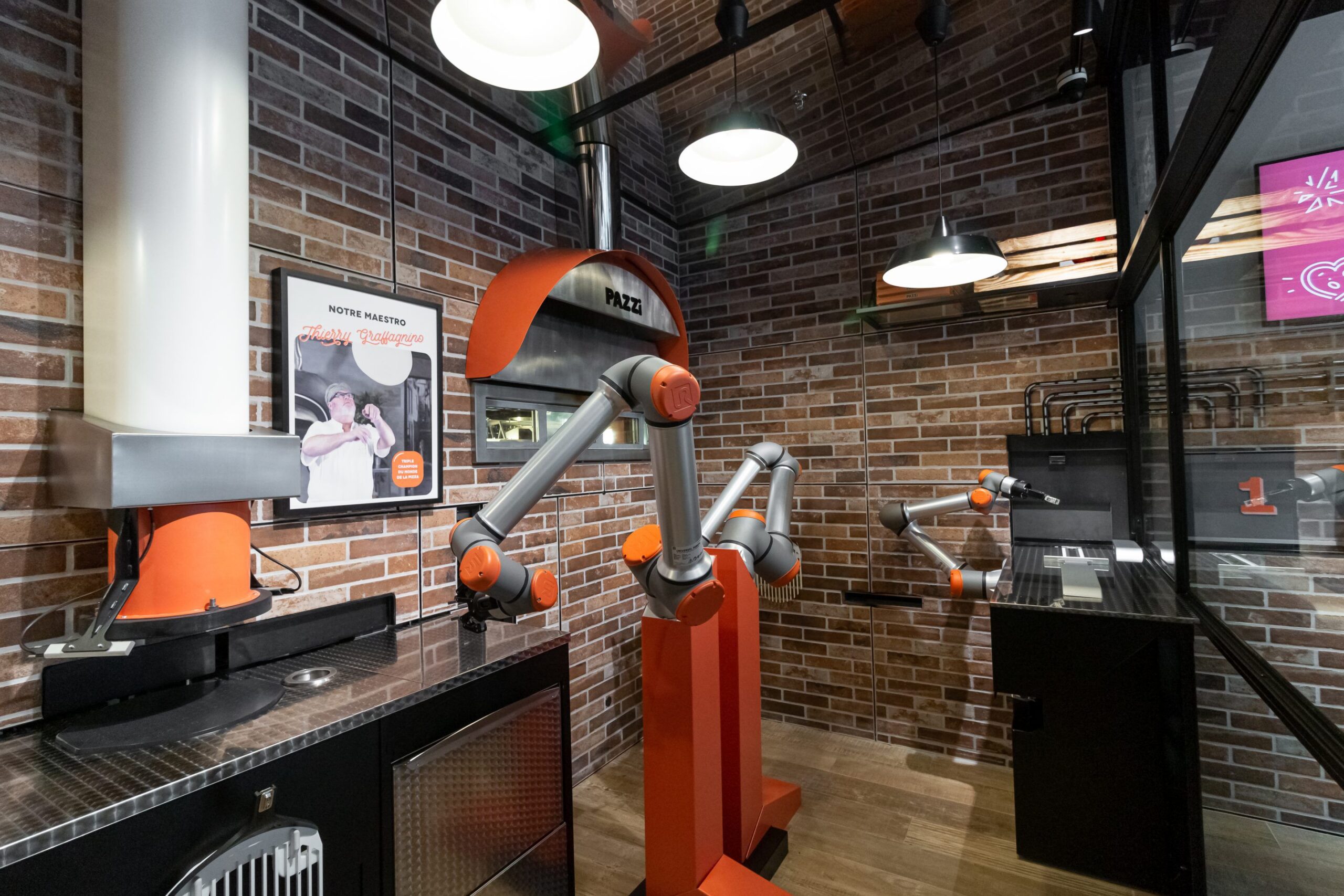 Pazzi Robotics pizza-making robot at pazzi restaurant in Paris, France