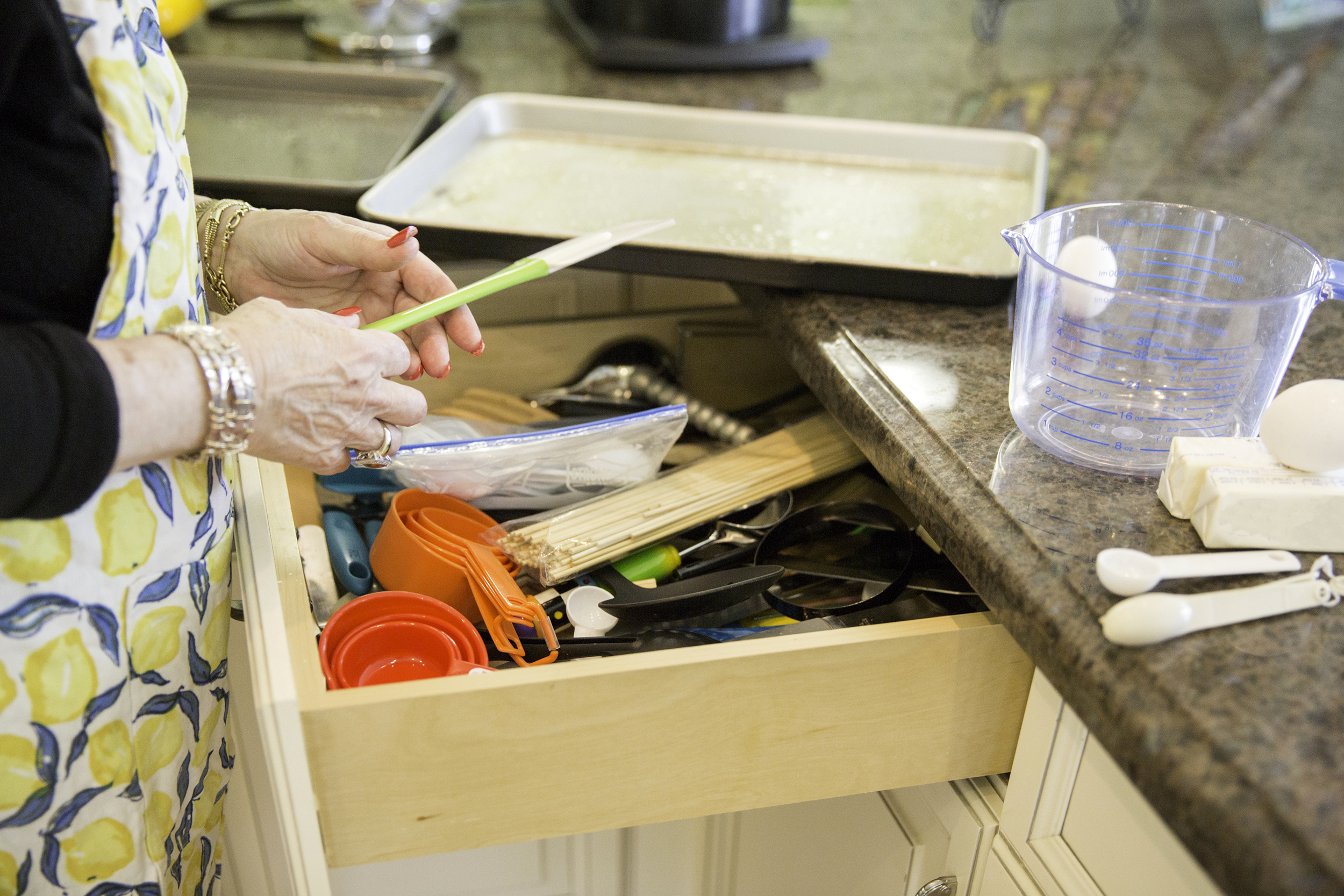 Closeup of senior woman with baking tools