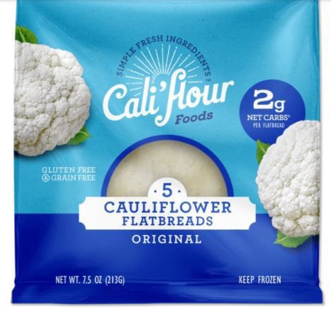 A package of Cali'flour Foods Original Cauliflower Flatbreads featuring images of cauliflower, nutrition highlights like 2g net carbs per flatbread, and labels for gluten free, grain free, net weight 7.5 oz, and keep frozen.