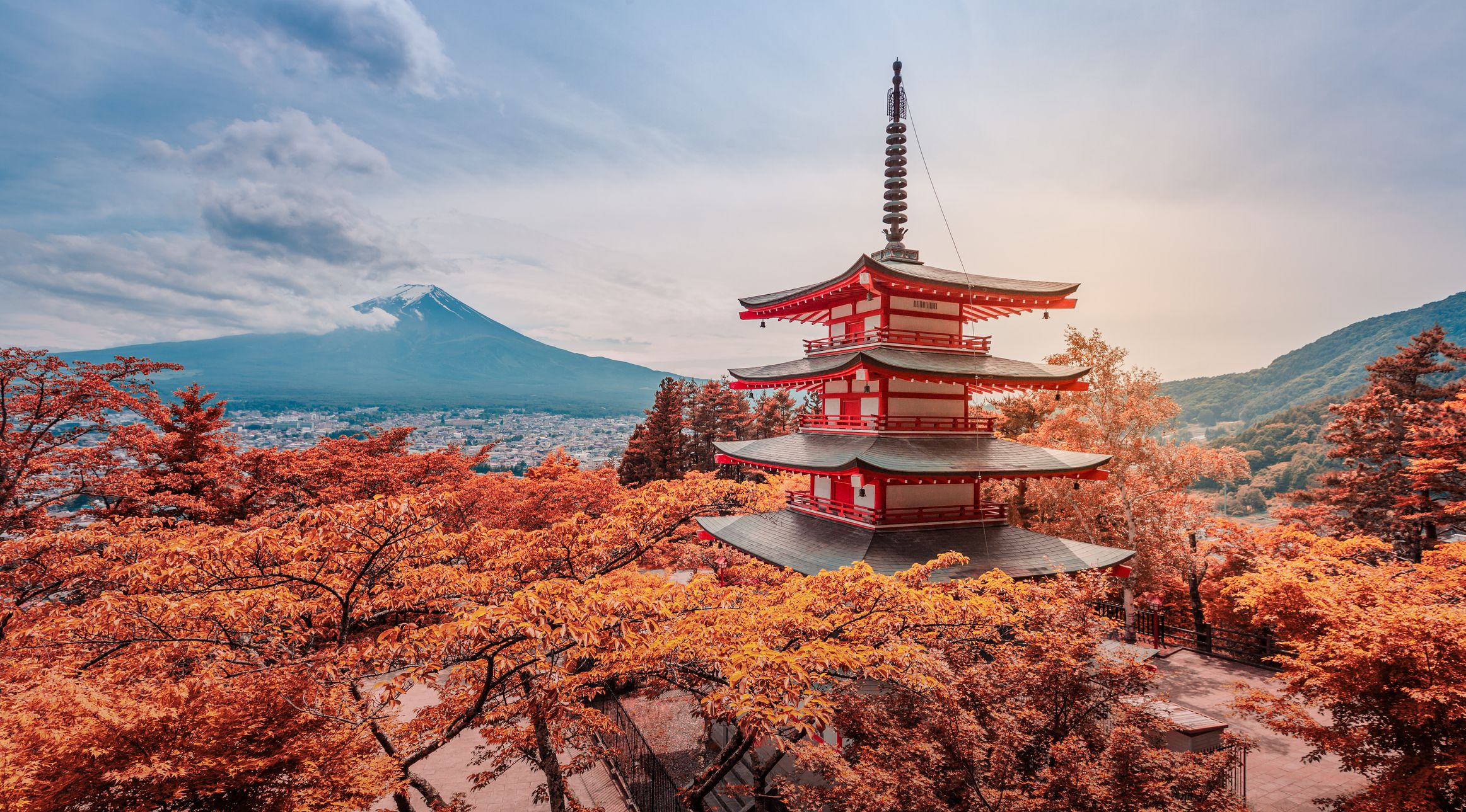 Fujiyoshida, Japan - June 08, 2018: The Chureito Pagoda, a five-storied pagoda also known as the Fujiyoshida Cenotaph Monument, on the top of viewpoint can see mt. Fuji on the background.