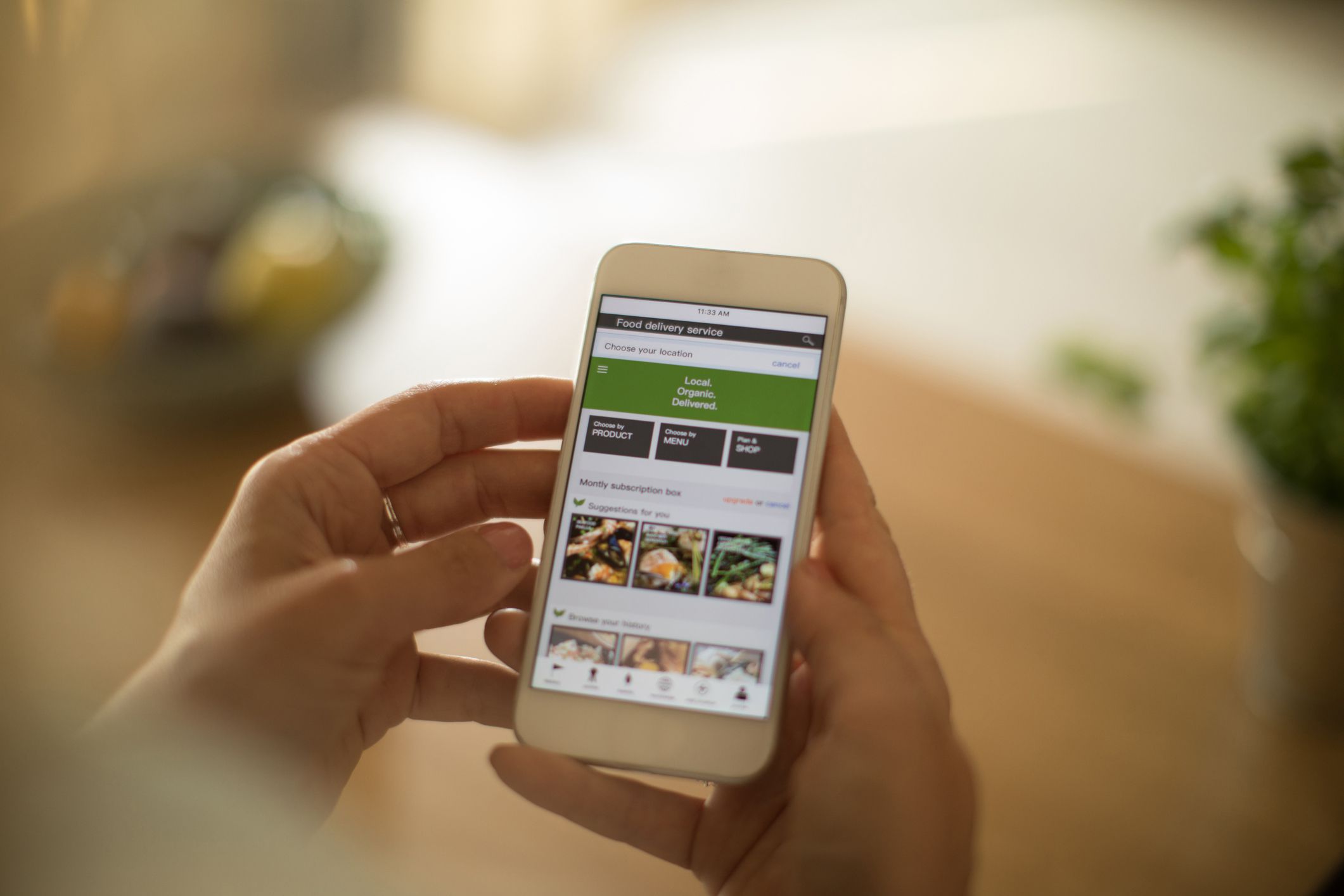 Woman is using mobile phone to order healthy organic veggies. She want to prepare healthy meal