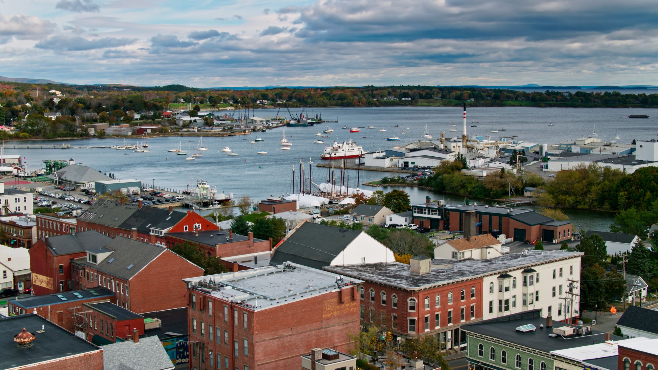 Drone shot of Rockland, a small fishing town in Maine on a sunny morning in Fall.