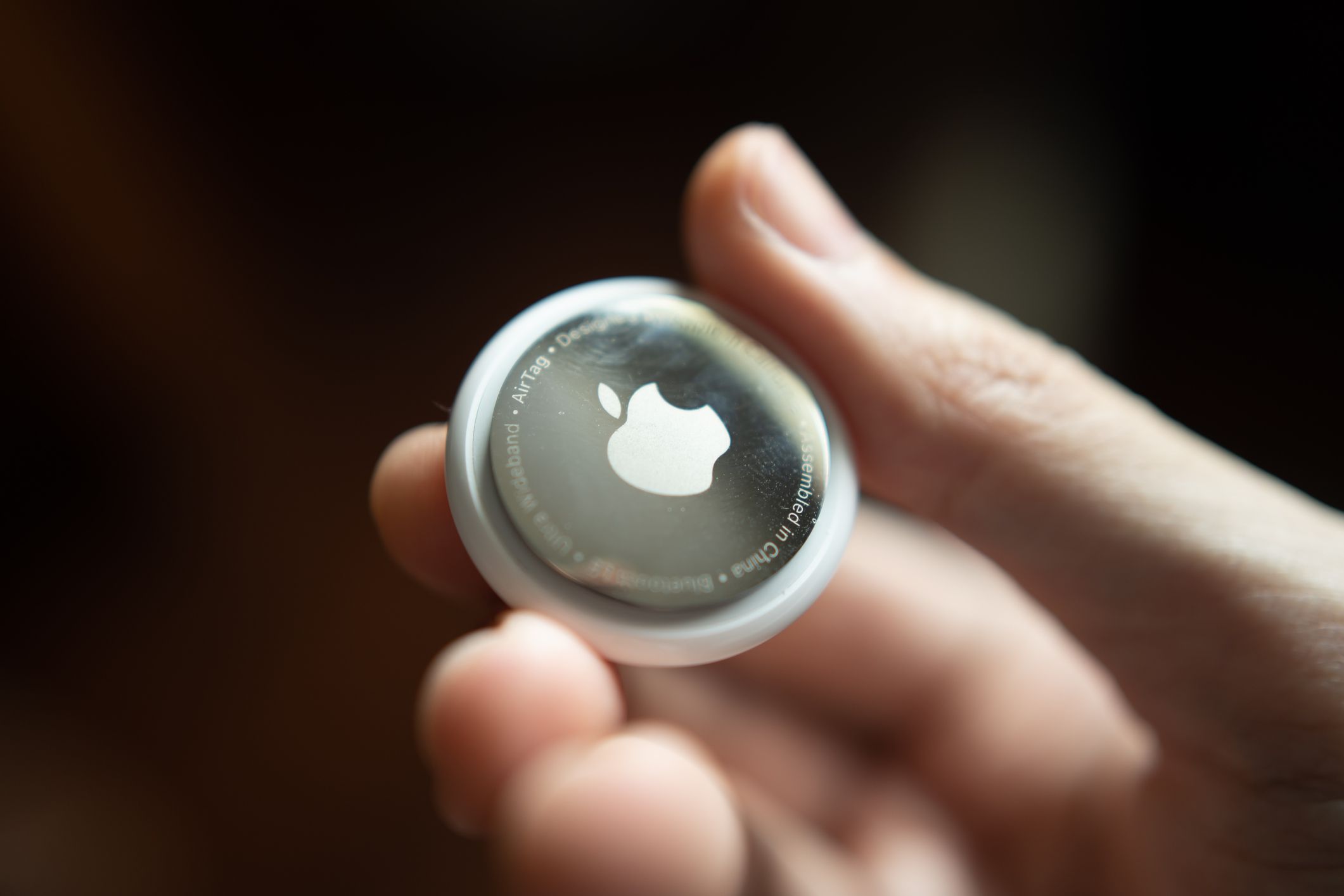 Bangkok, Thailand - Febrauary 5, 2022: AirTag is a tracking device developed by Apple.