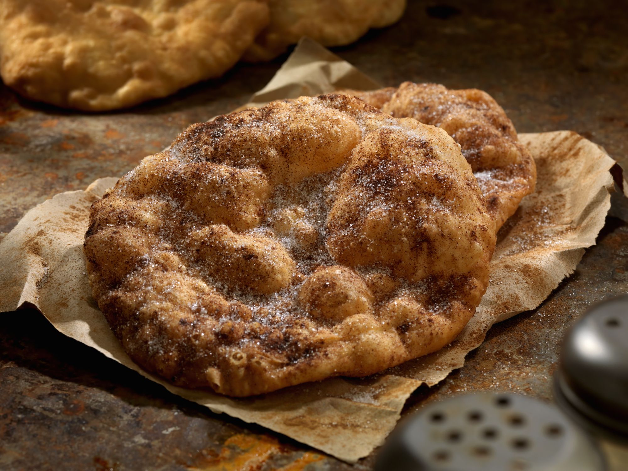 Fried Bread Dough with Cinnamon and Sugar also known as: fry dough, fry bread, fried bread, doughboys, elephant ears, scones, frying saucers and Dough gods-Photographed on Hasselblad H3D2-39mb Camera