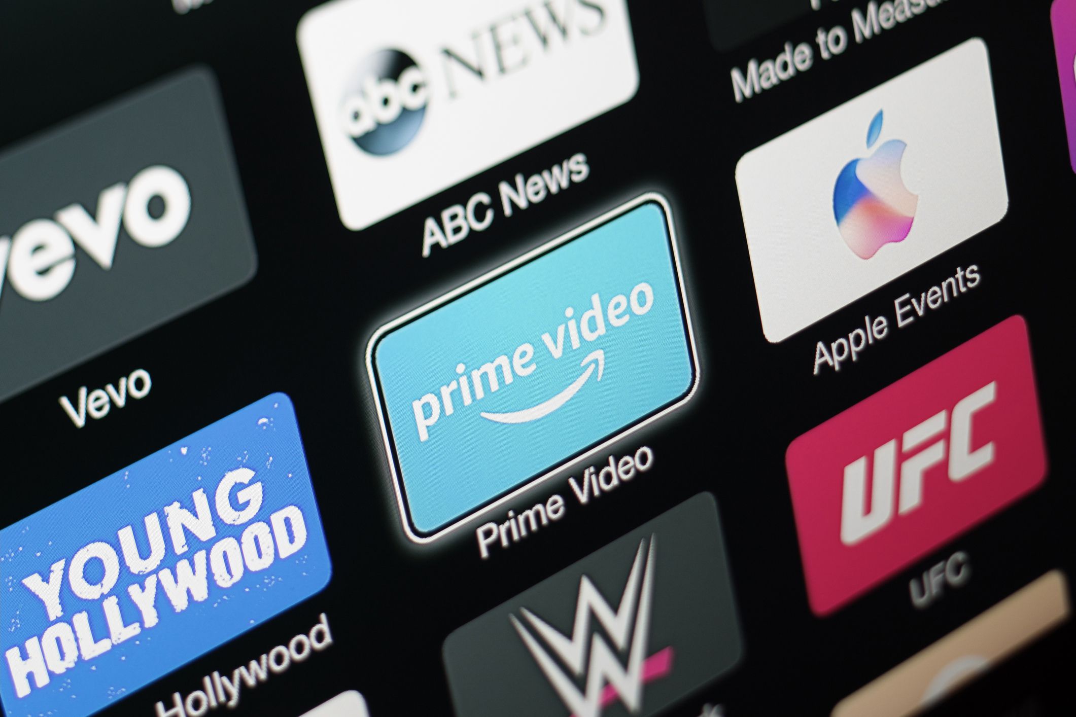 TV connected to a recently updated Apple TV, 3rd generation, where some media-centric apps (Prime Video, Vevo, Young Hollywood, abc news, etc) are visible