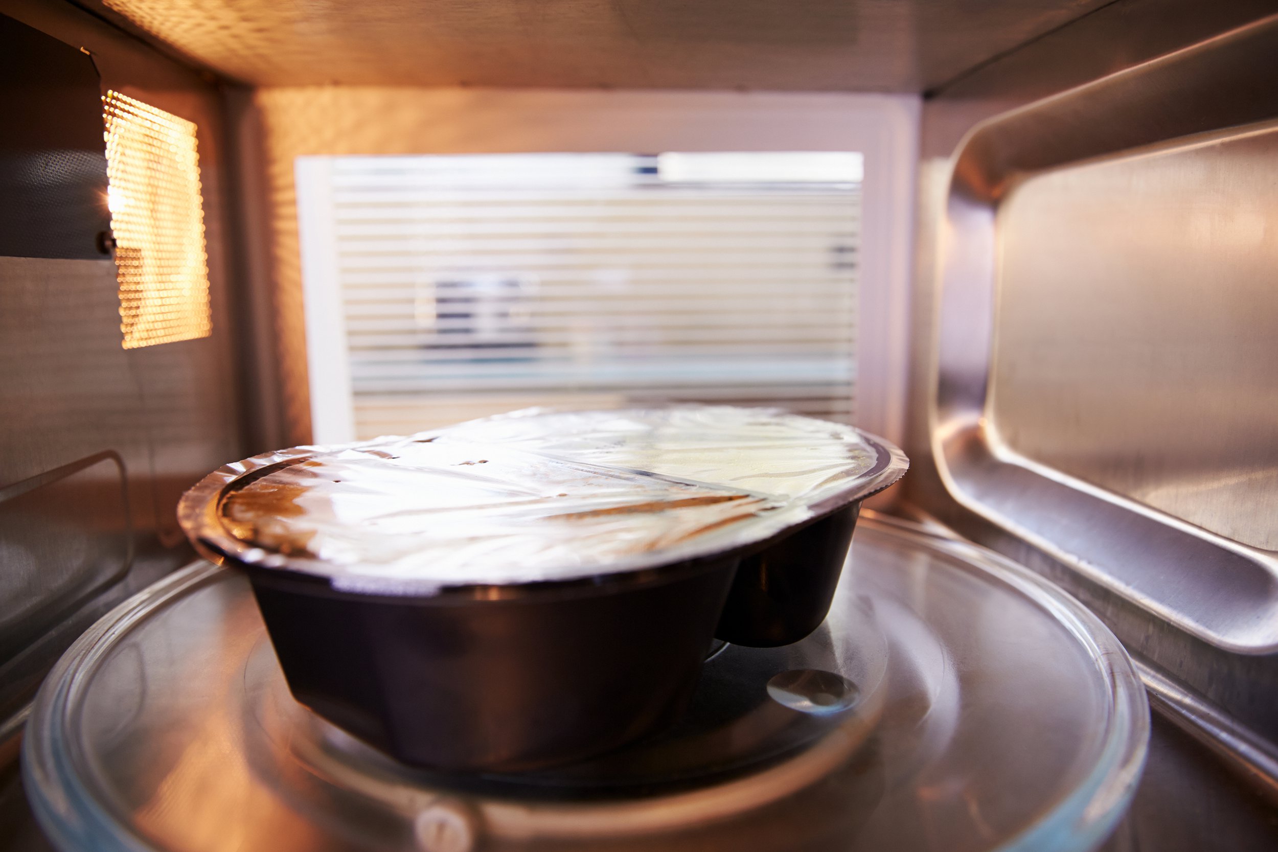 Microwaving a frozen meal