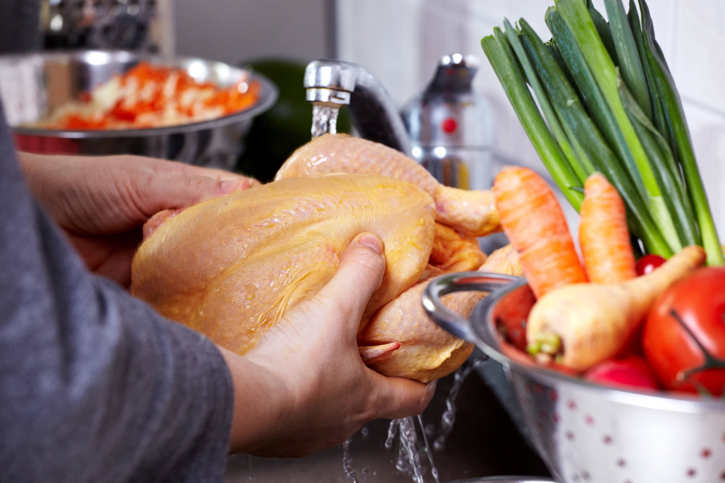 Washing a whole chicken in the kitchen sink
