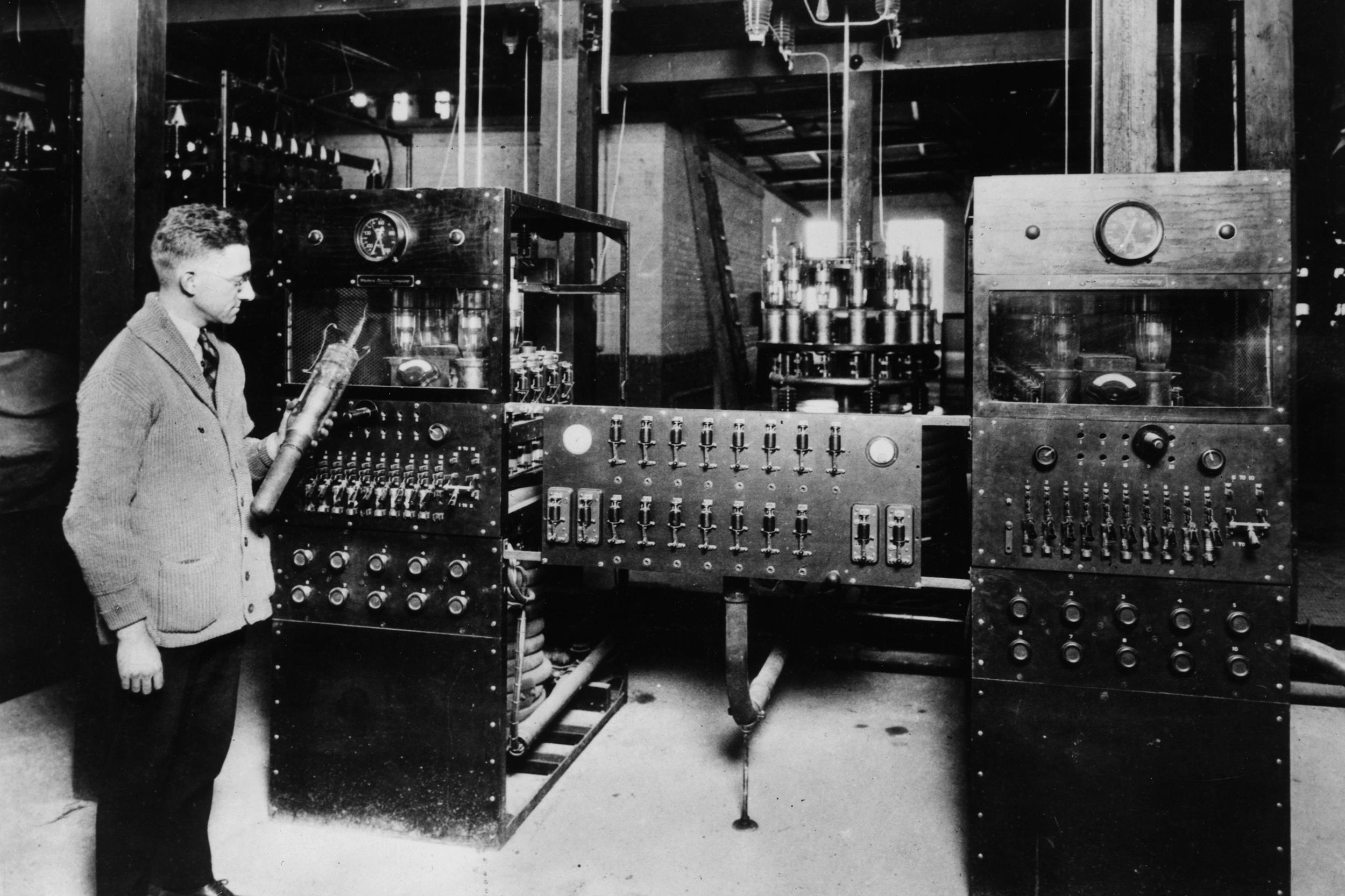 Two banks of high power water-cooled amplifying tubes, part of the high power portion of a radio telephone transmitter. This apparatus was used in the transatlantic telephone tests by the American Telephone and Telegraph Company and the Radio Corporation