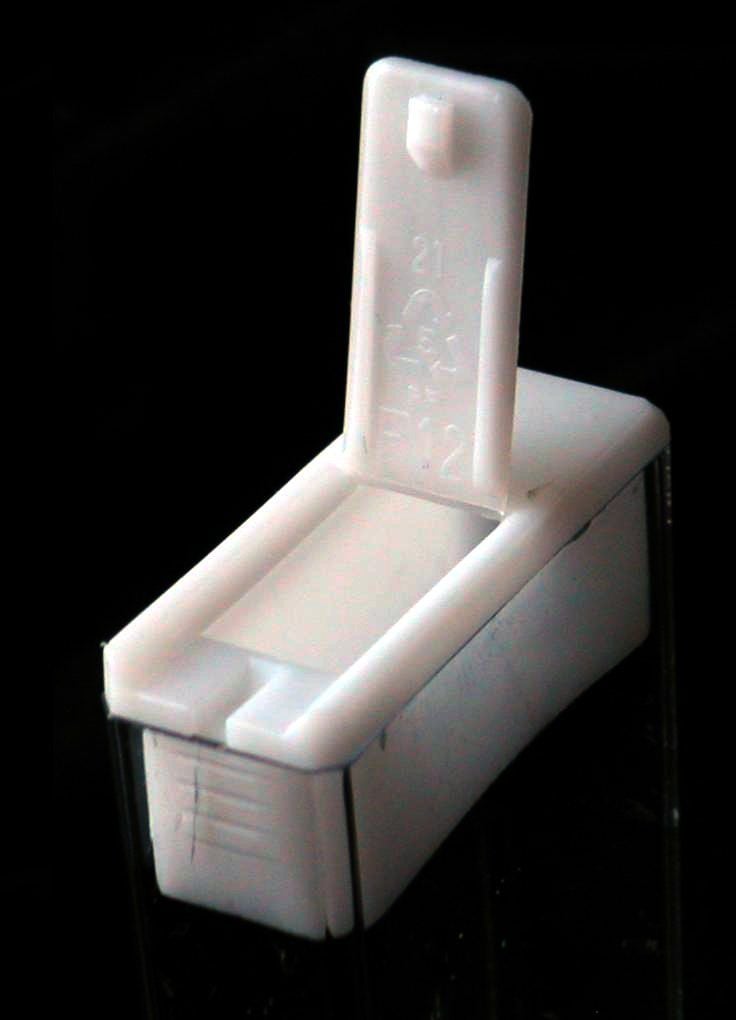 Indentation on Tic Tac Cap