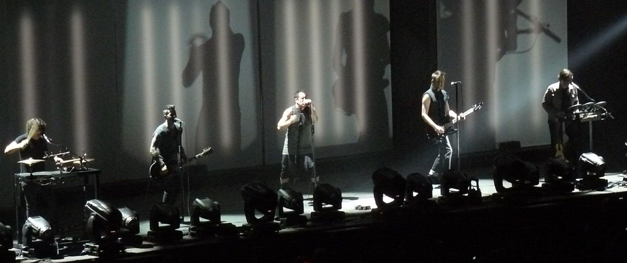 Nine Inch Nails performing live at Mediolanum Forum, Milan in 2013.