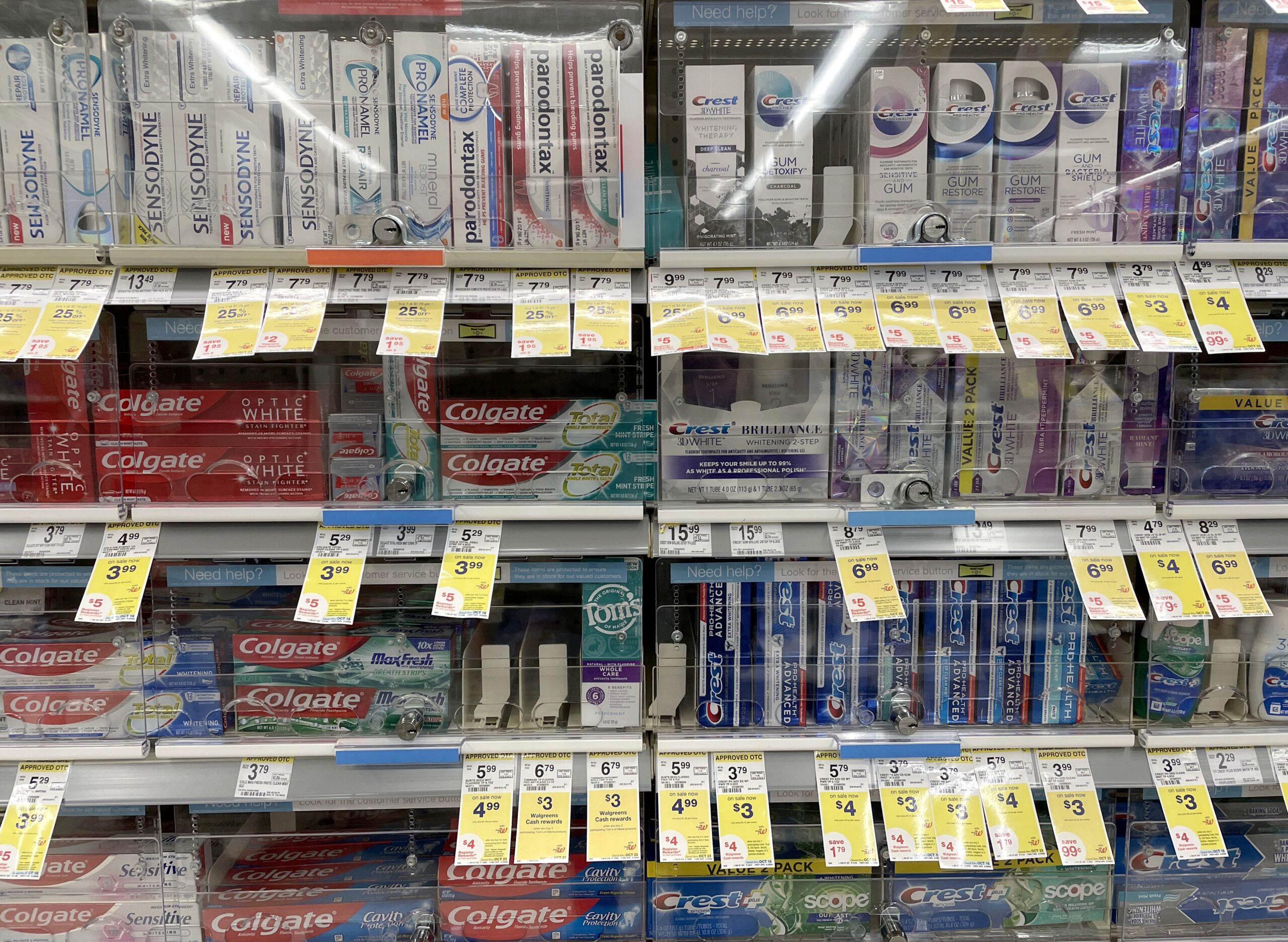 Products are displayed in locked security cabinets at a Walgreens store that is set to be closed in the coming weeks on October 13, 2021 in San Francisco, California.