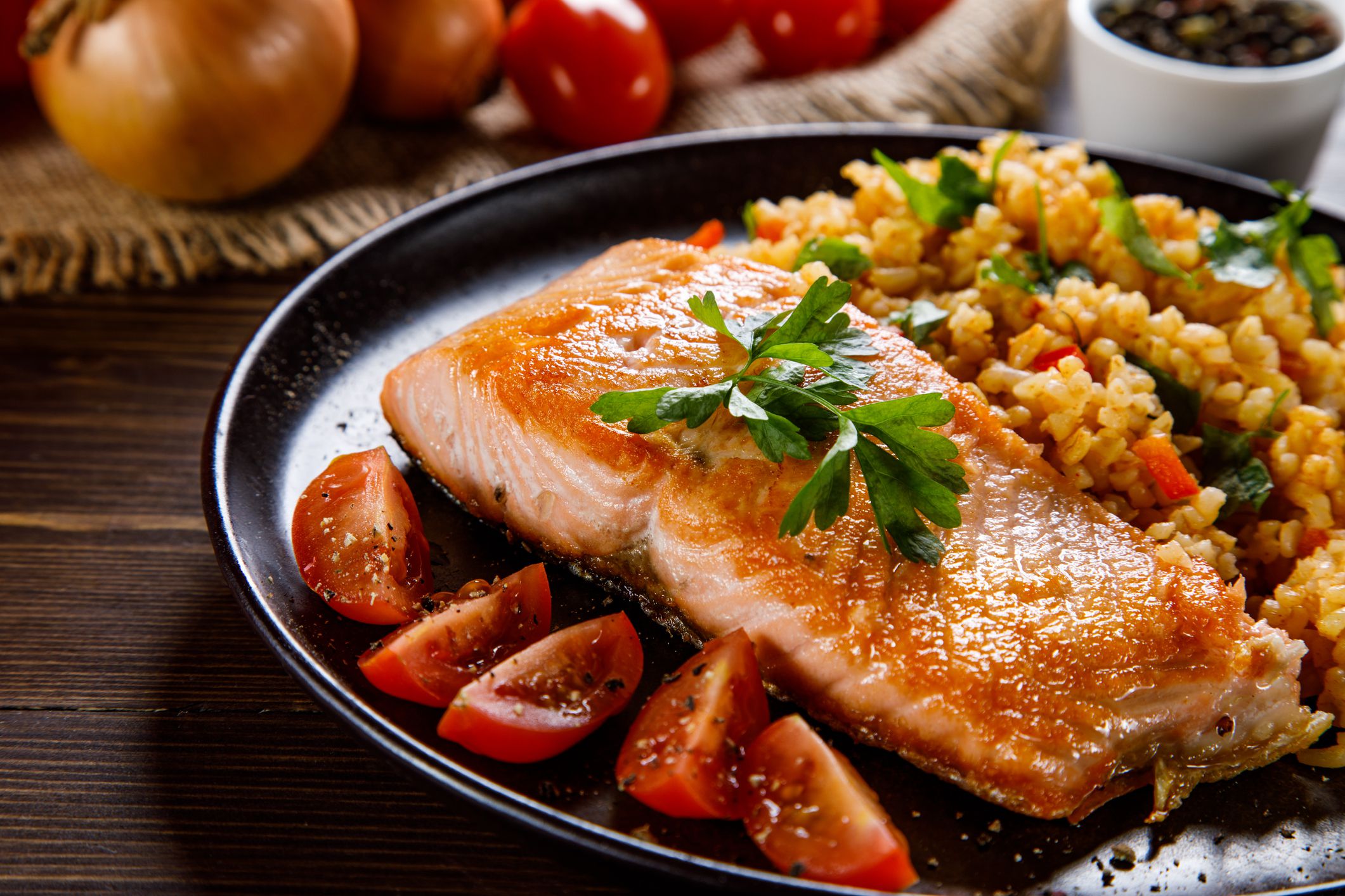 Grilled salmon with groats and vegetables