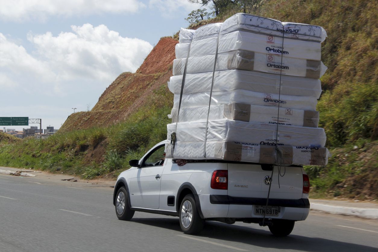 Truck Hauling Mattresses