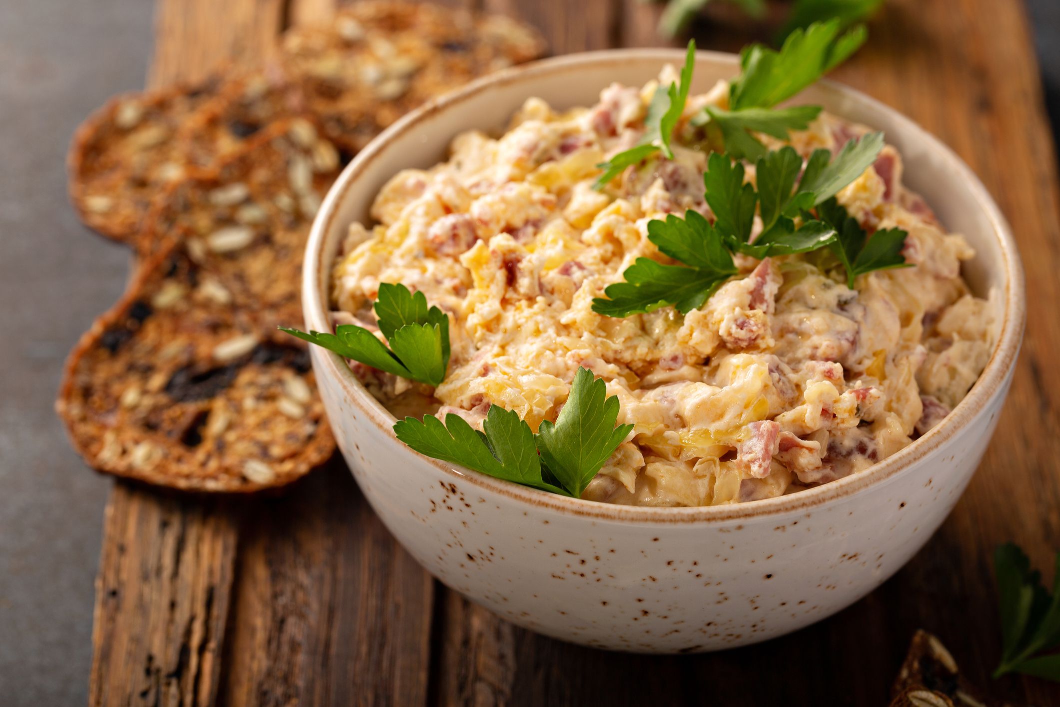 Homemade reuben dip with corned beef served with rue crackers