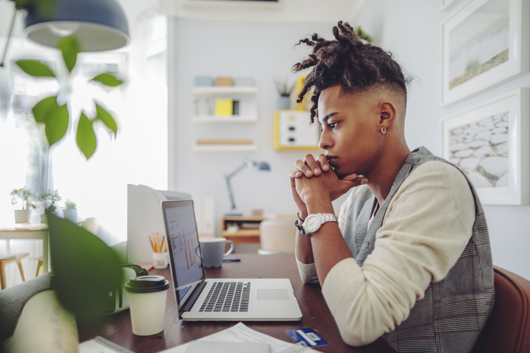 Young man working at home