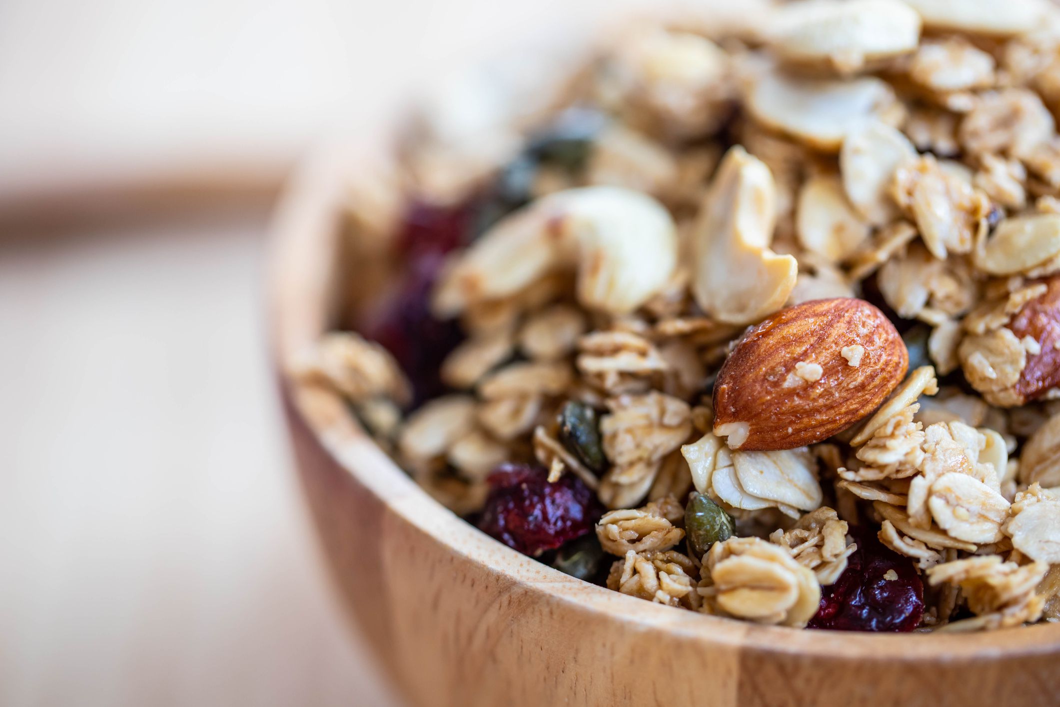 Various cereals and granola mix in a bowl