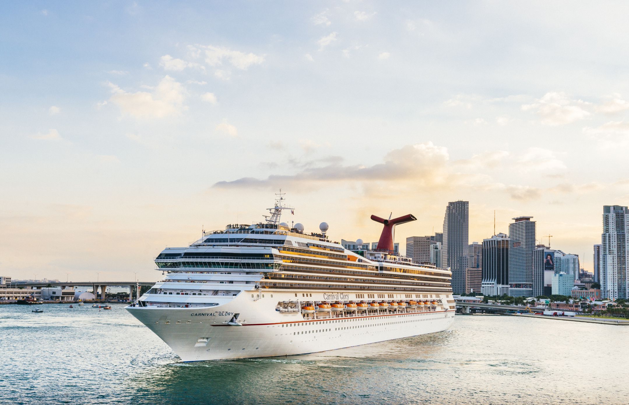 Miami, United States - November 19, 2016: A large passenger cruise ship, the Carnival Glory, turns around in Biscayne Bay as it prepares to exit the downtown Port of Miami via Government Cut.
