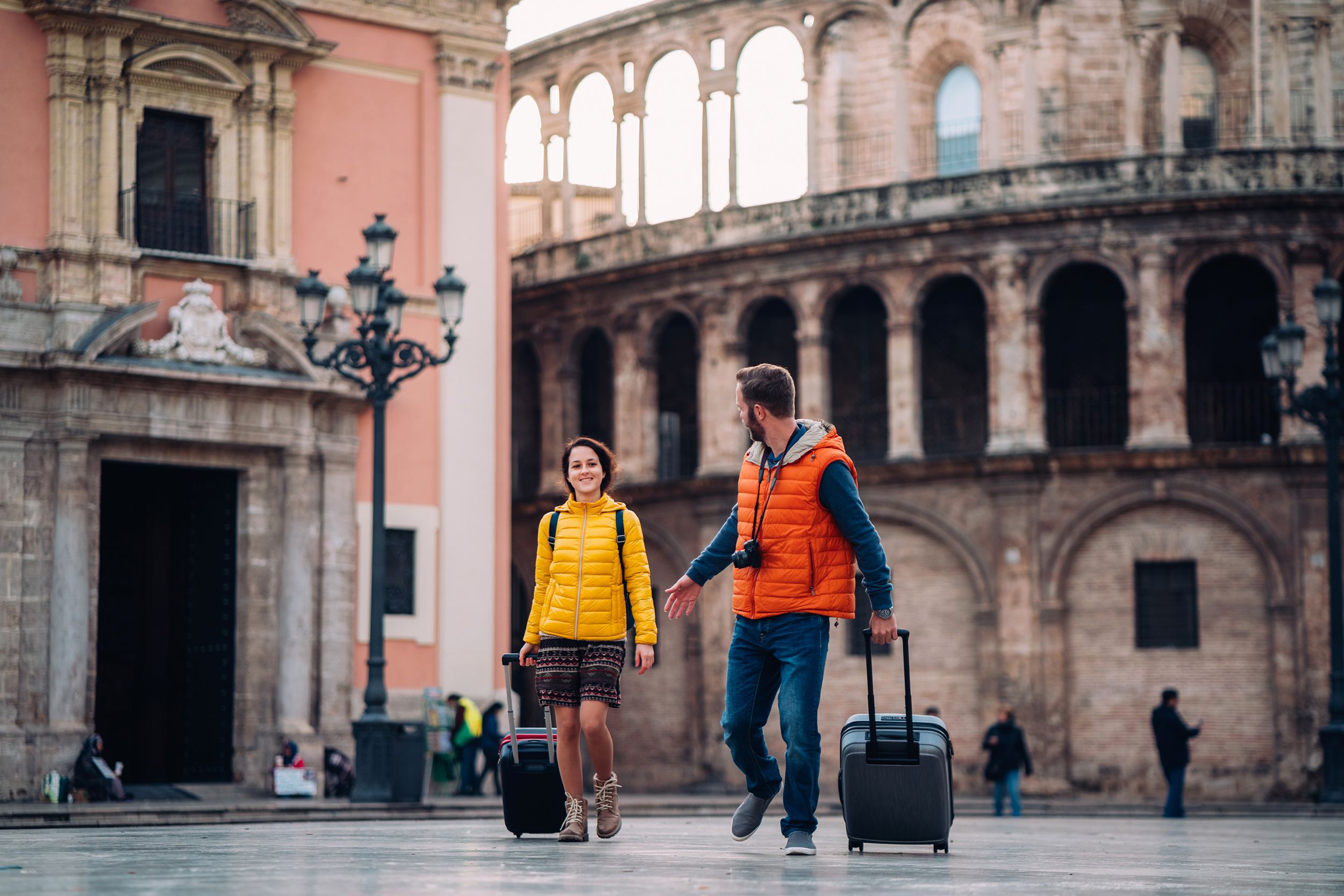 young couple on vacation traveling around Europe