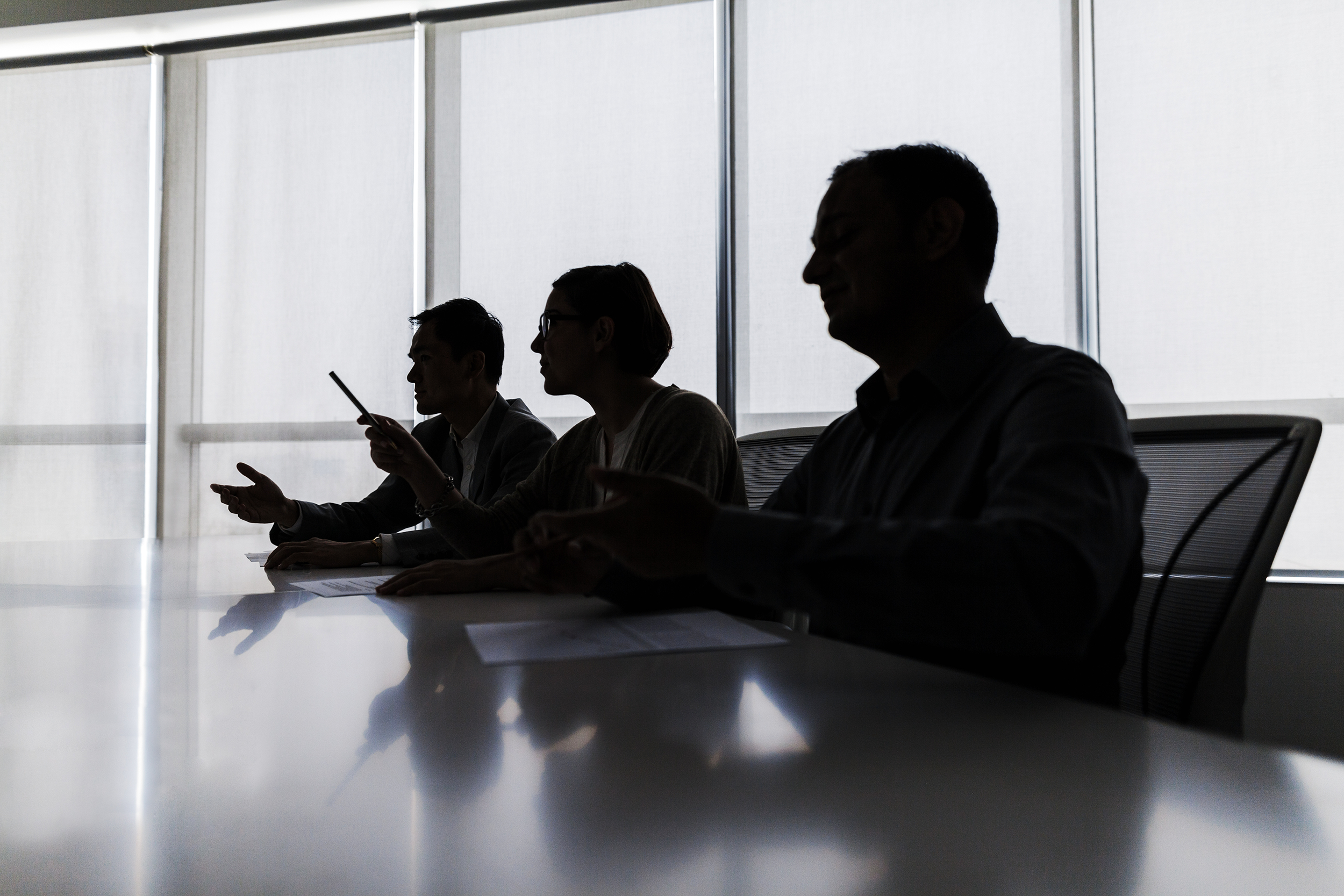 Business people having a secret meeting