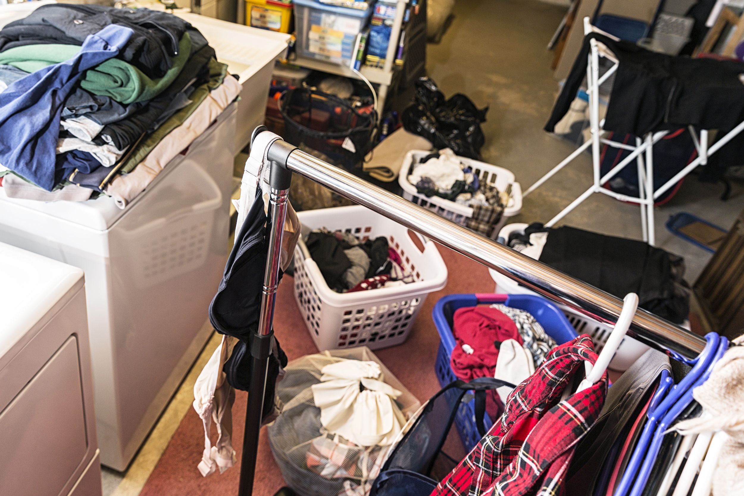 messy busy big family basement laundry room