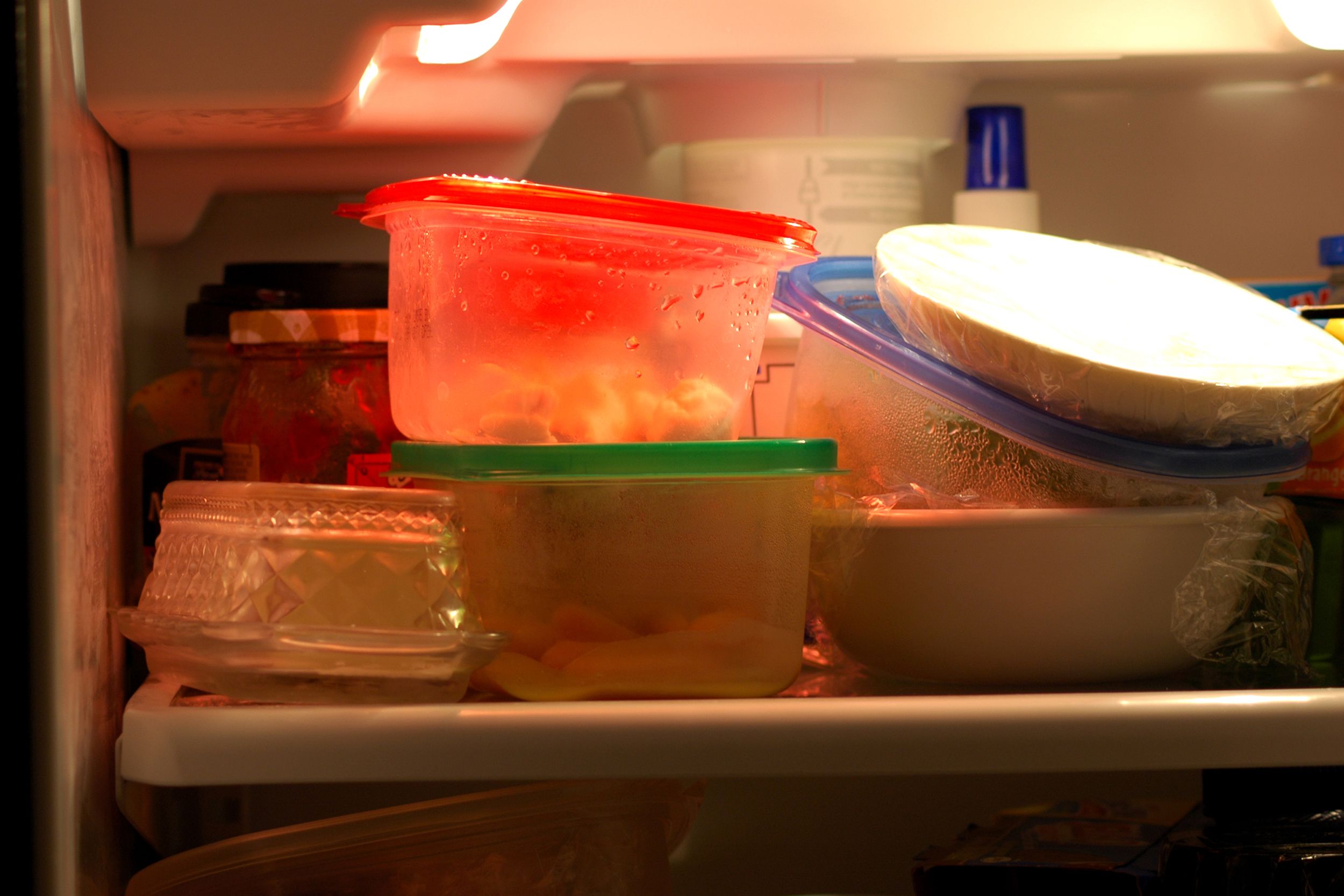 shelf in messy refrigerator