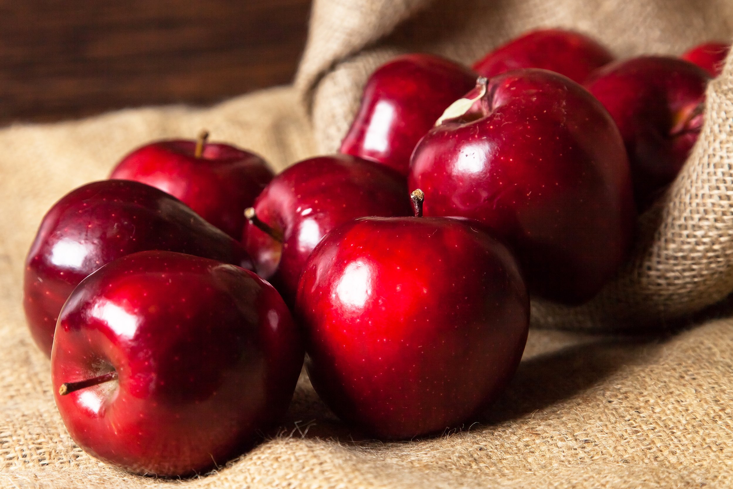 apples spilling from basket