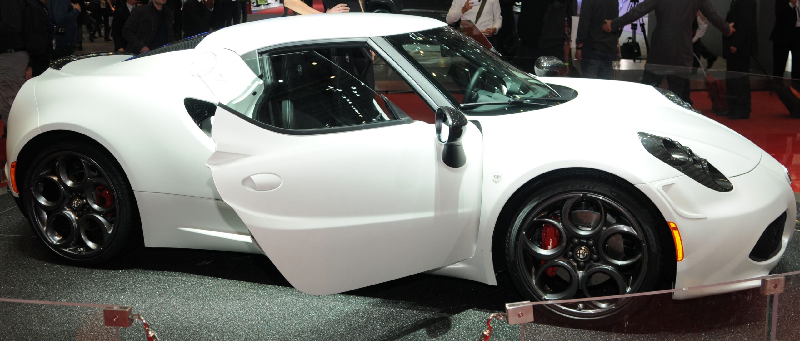 White Exotic italian Sports car - Alfa Romeo 4C Sport car at Auto Show