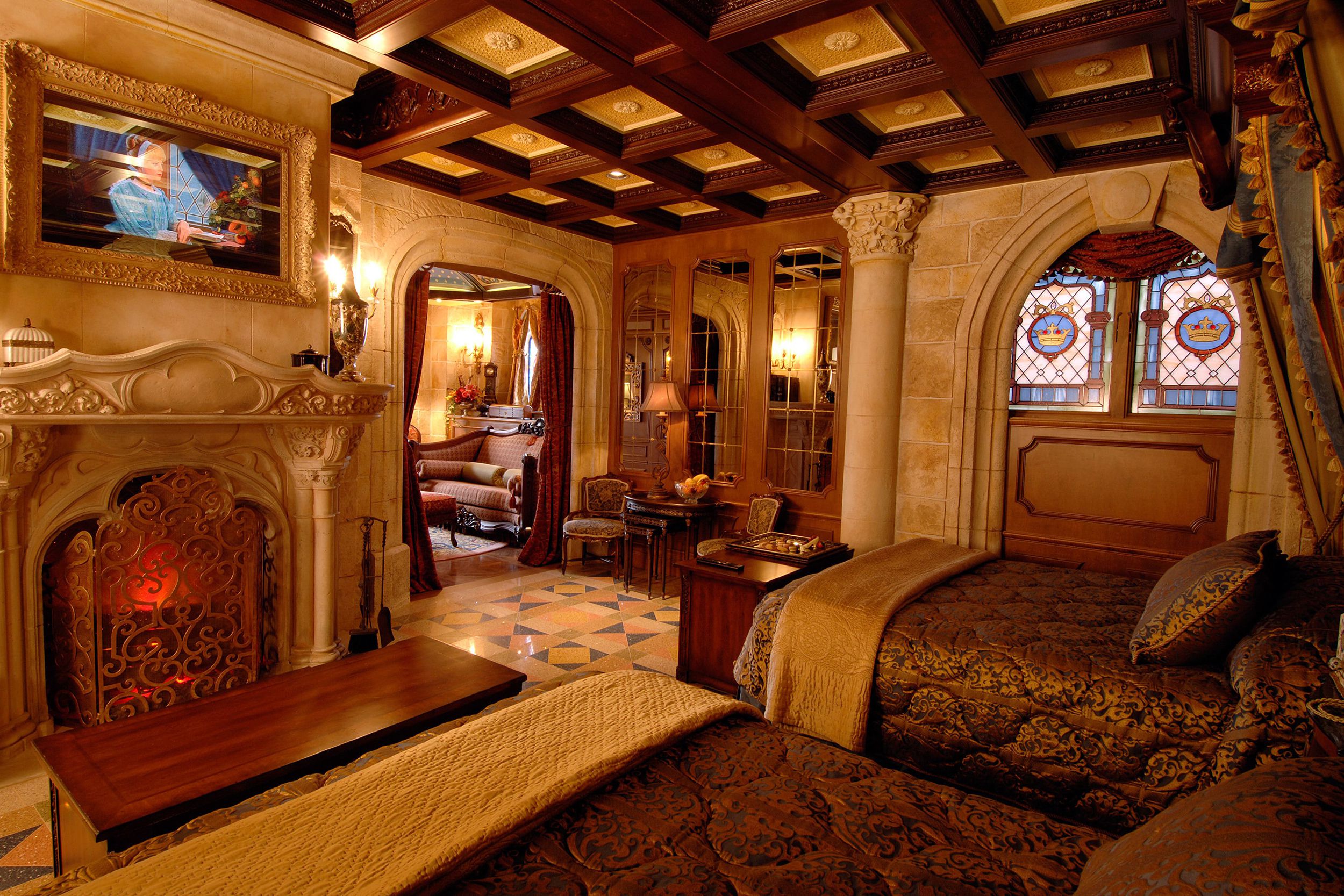 Bedroom in the Foreground with Living Room in the Background of Cinderella Castle Suite of Disney World, Orlando, Florida