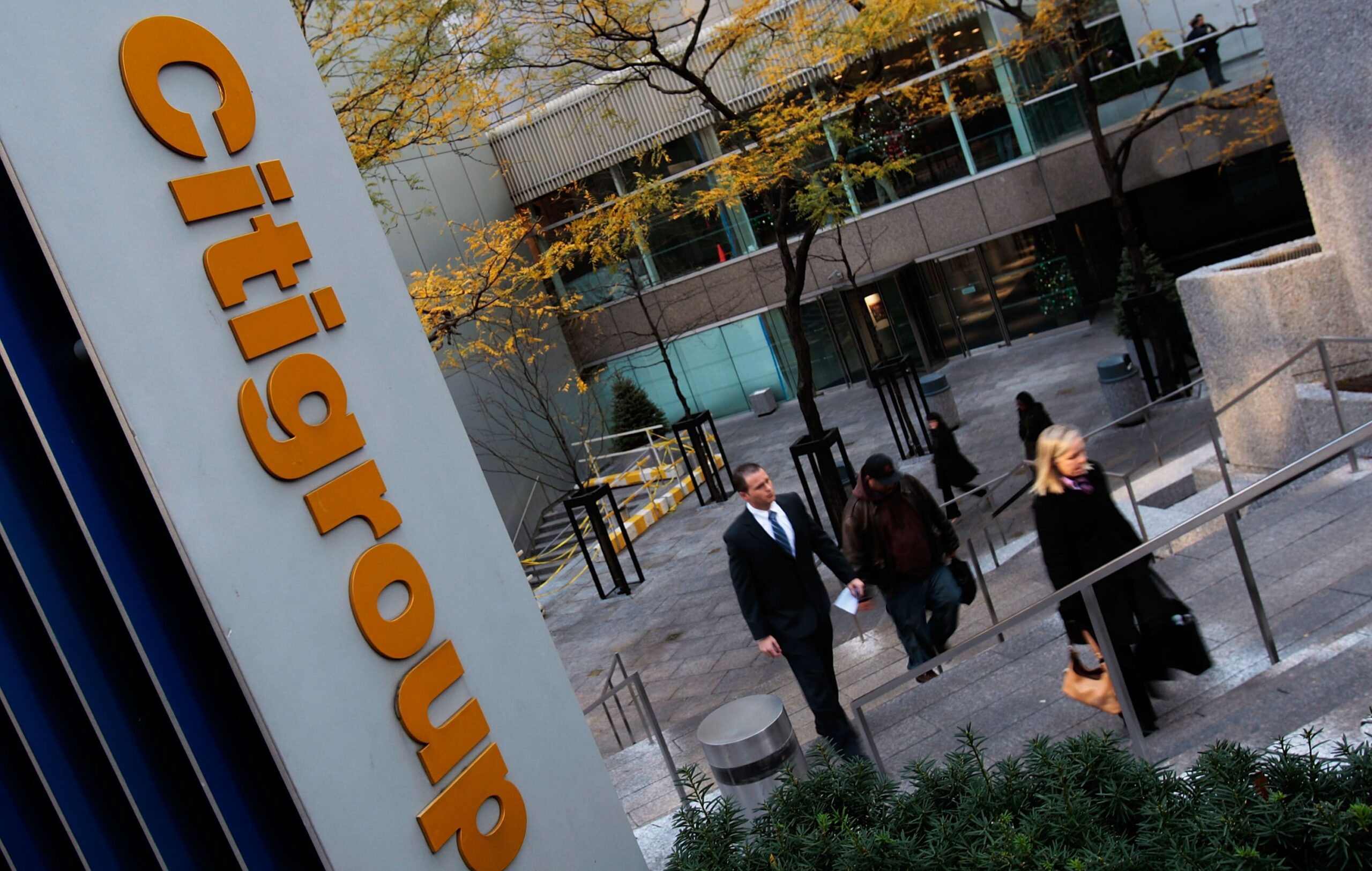 People walk up from the plaza at the Citigroup Center November 17, 2008 in New York City. Citigroup Inc. announced that it is cutting 53,000 jobs as it struggles to deal with massive debt due to the banking crisis.