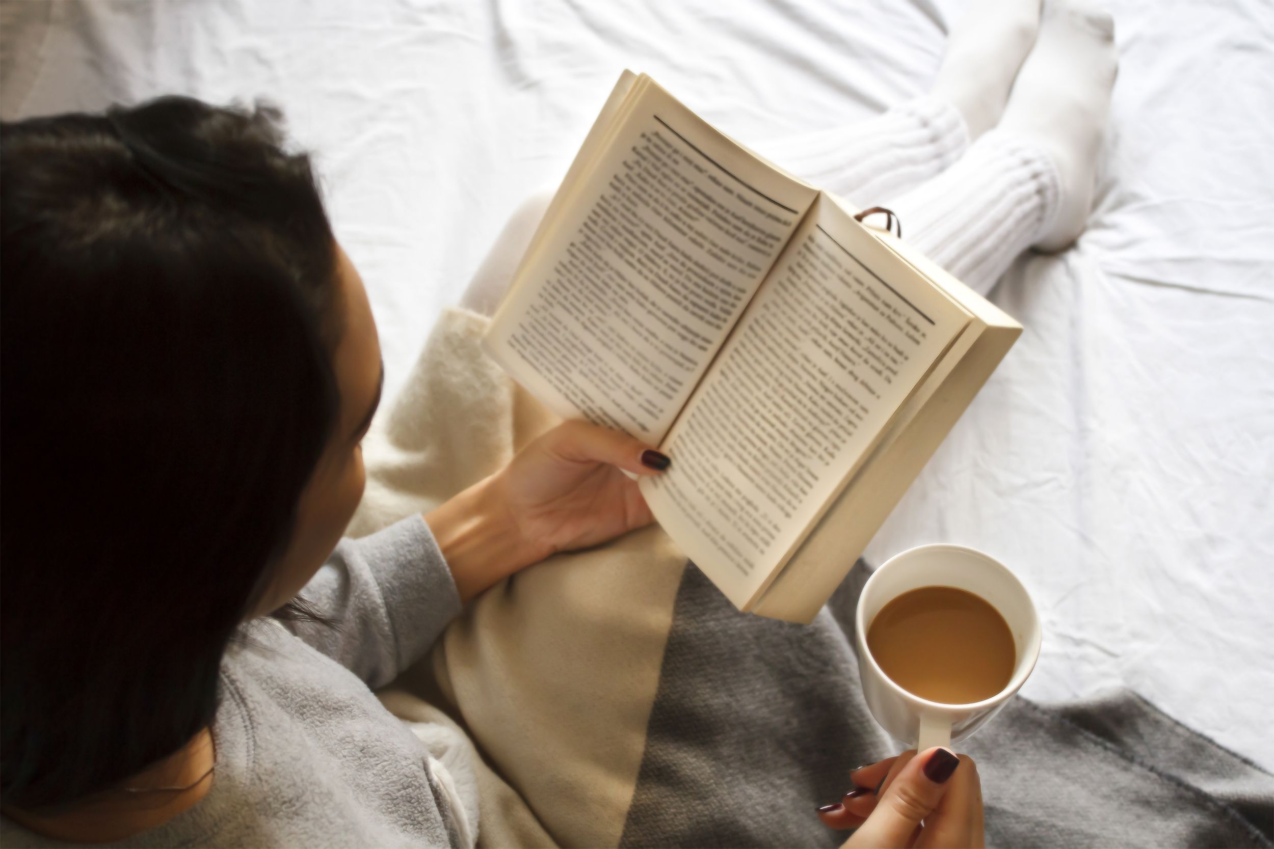 Reading a book in bed