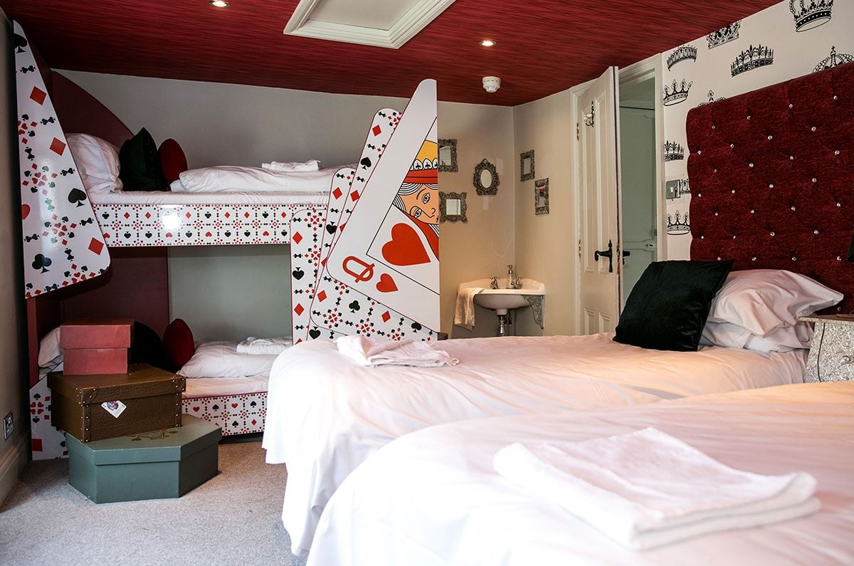 Bunk Beds and Two Twin Beds of The Queen of Hearts Room of Wonderland House, Brighton, England