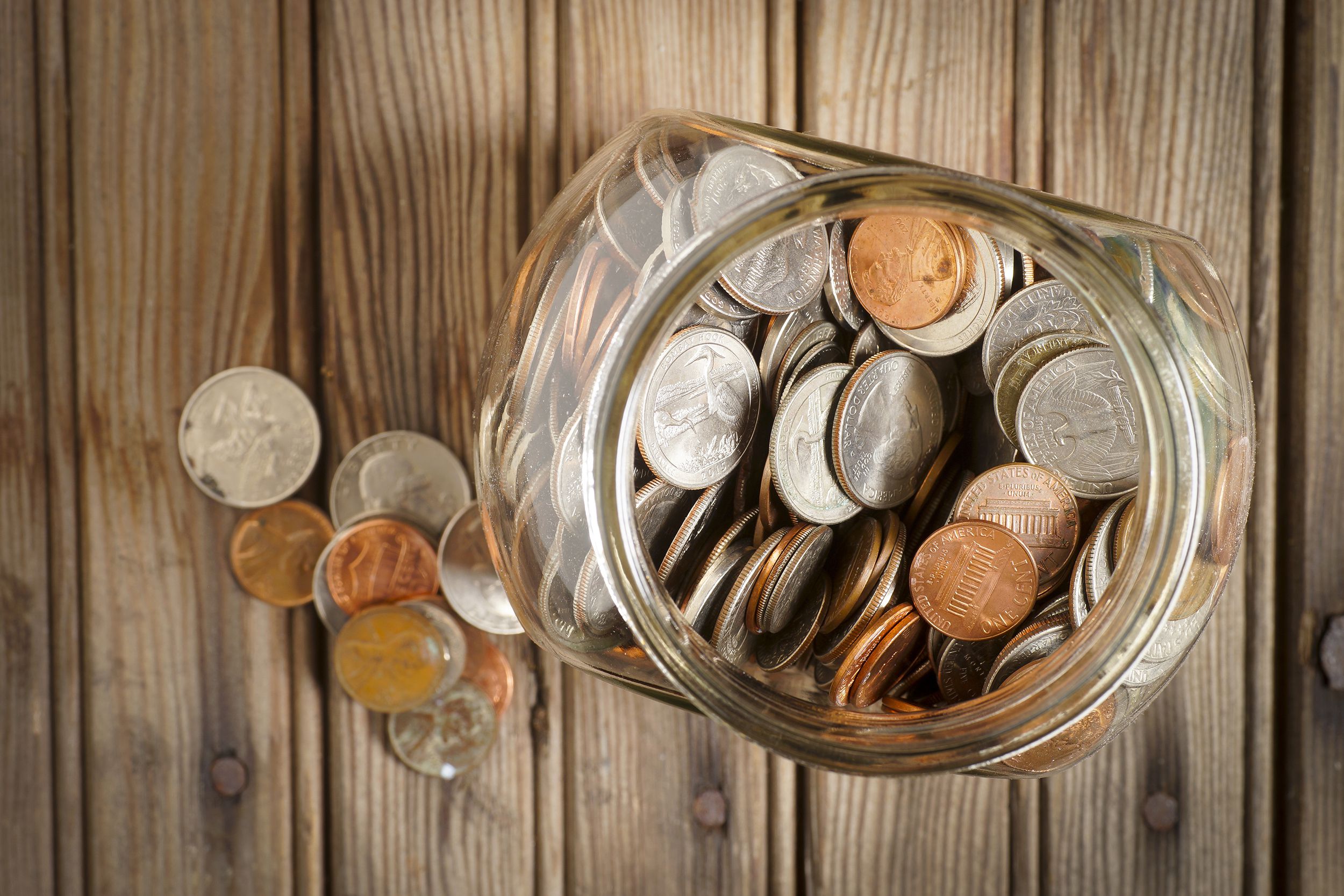 glass jar filled with coins