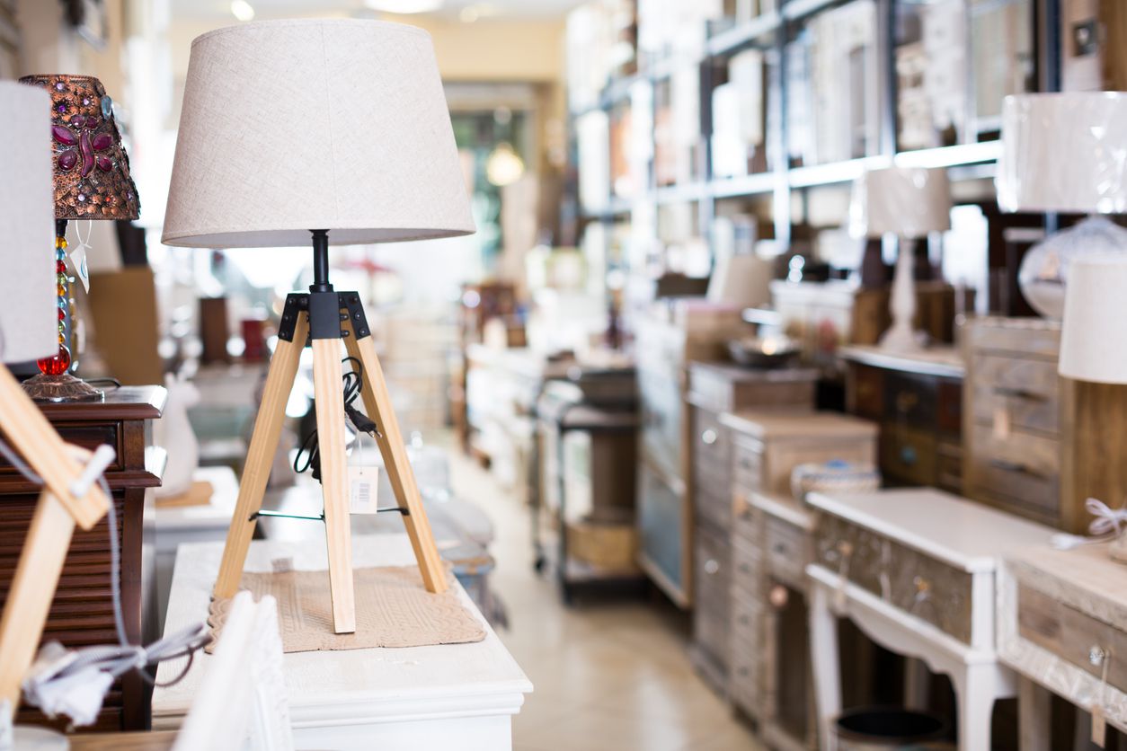 Old furniture offered for sale in secondhand shop