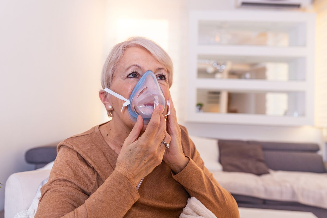 woman with oxygen mask