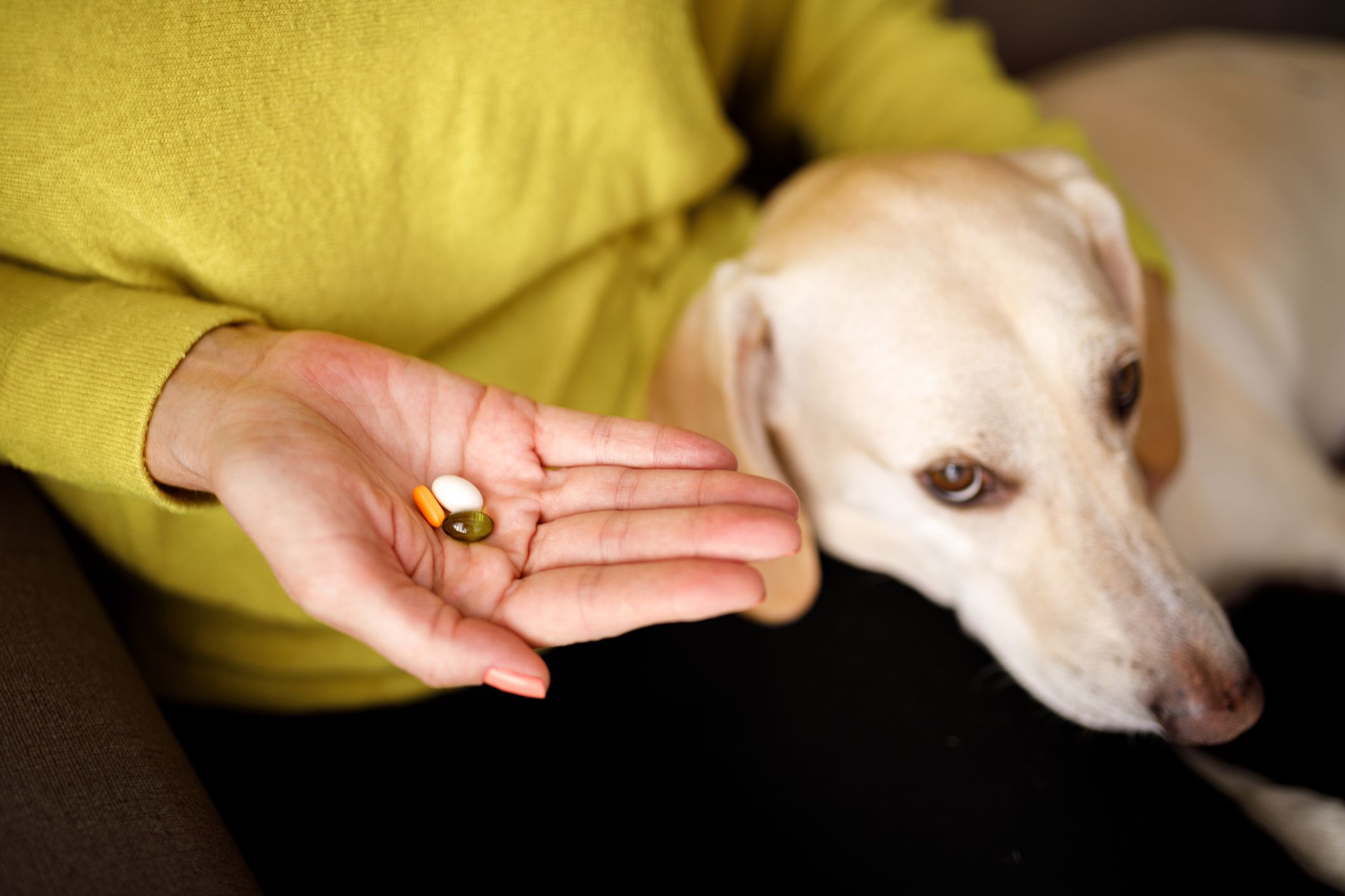 Woman taking supplements.