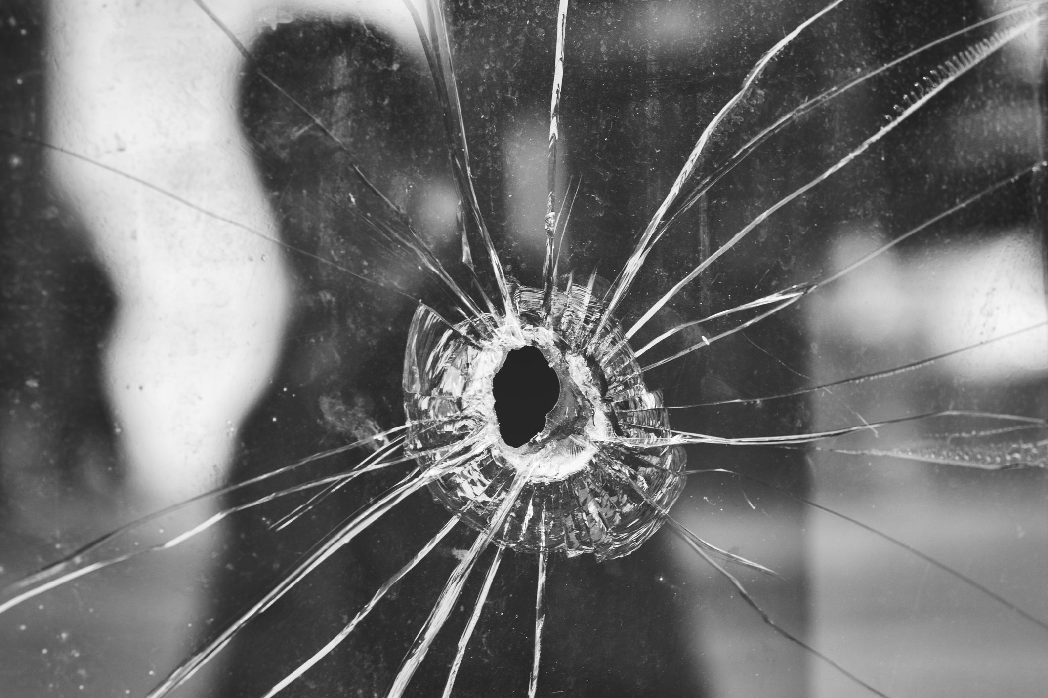 Bullet holes in a front windshield