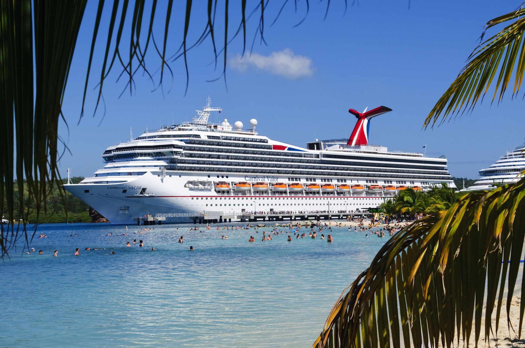 Roatan, Honduras - March 23, 2011: The M.S. Carnival Valor, owned by Carnival Cruise Lines, docked at Mahogany Bay on the Caribbean island of Roatan.
