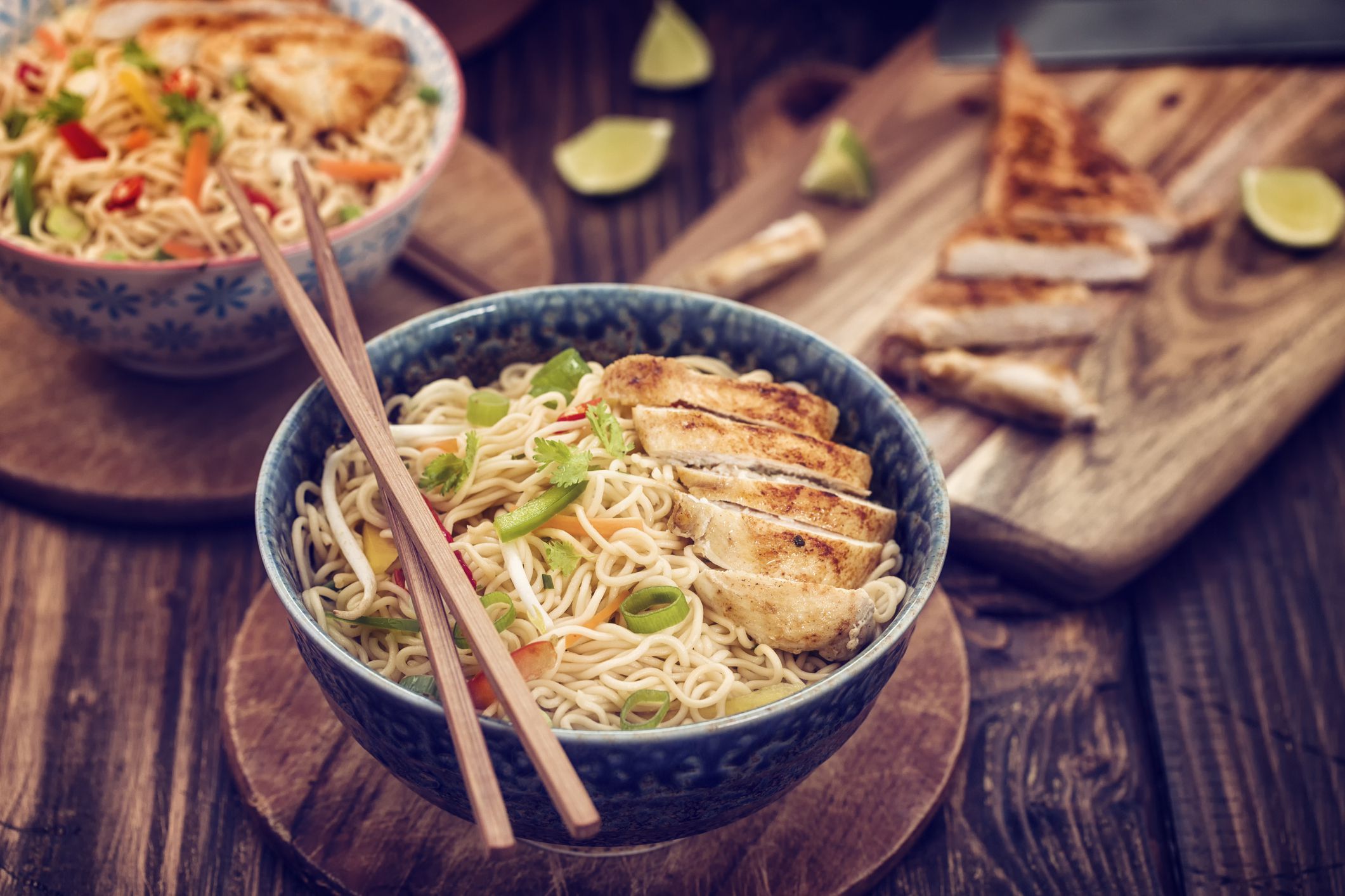 Asian Chicken Noodles Stir Fry with vegetables and grilled chicken