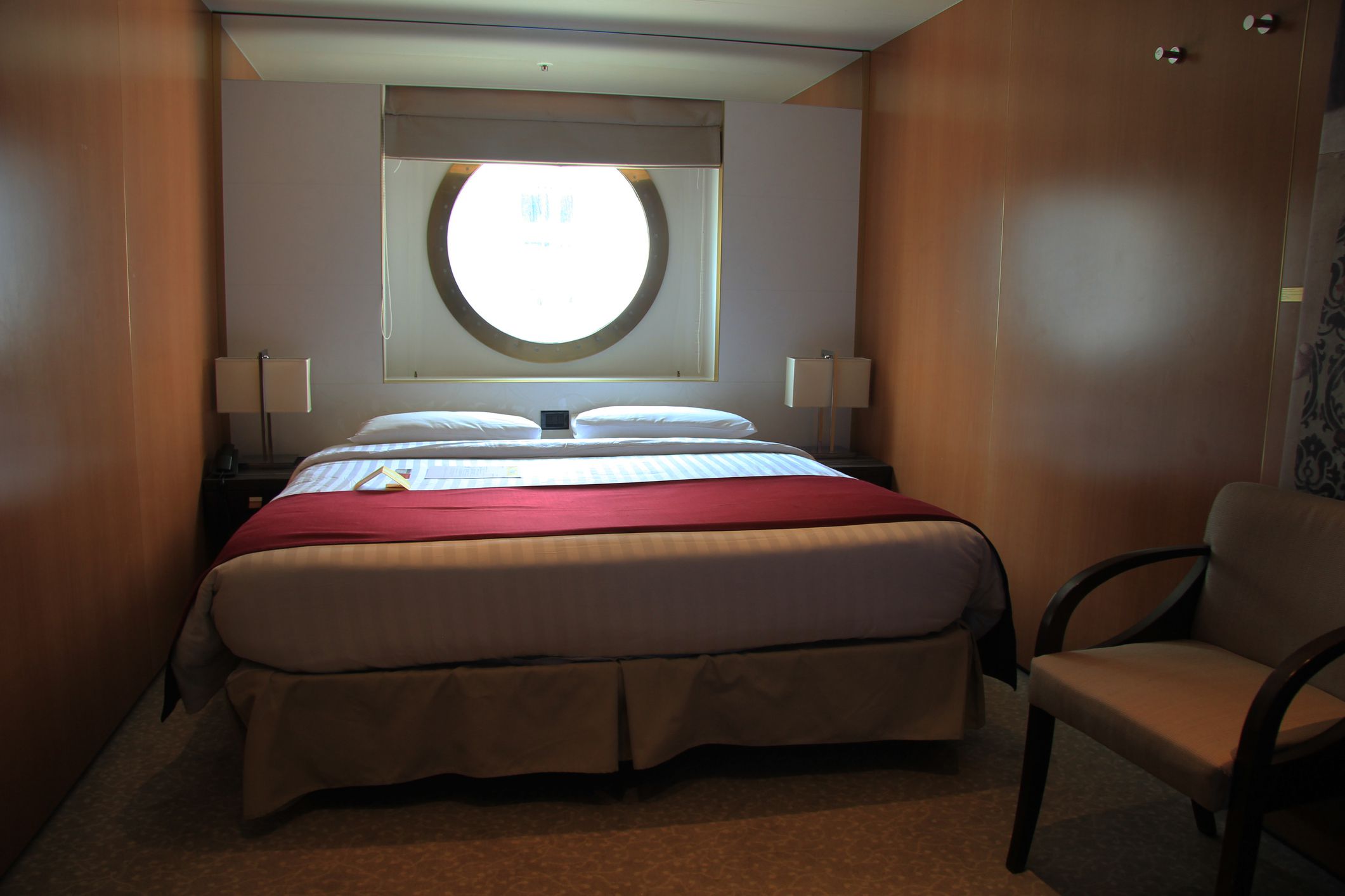 standard inside cruise ship cabin with window