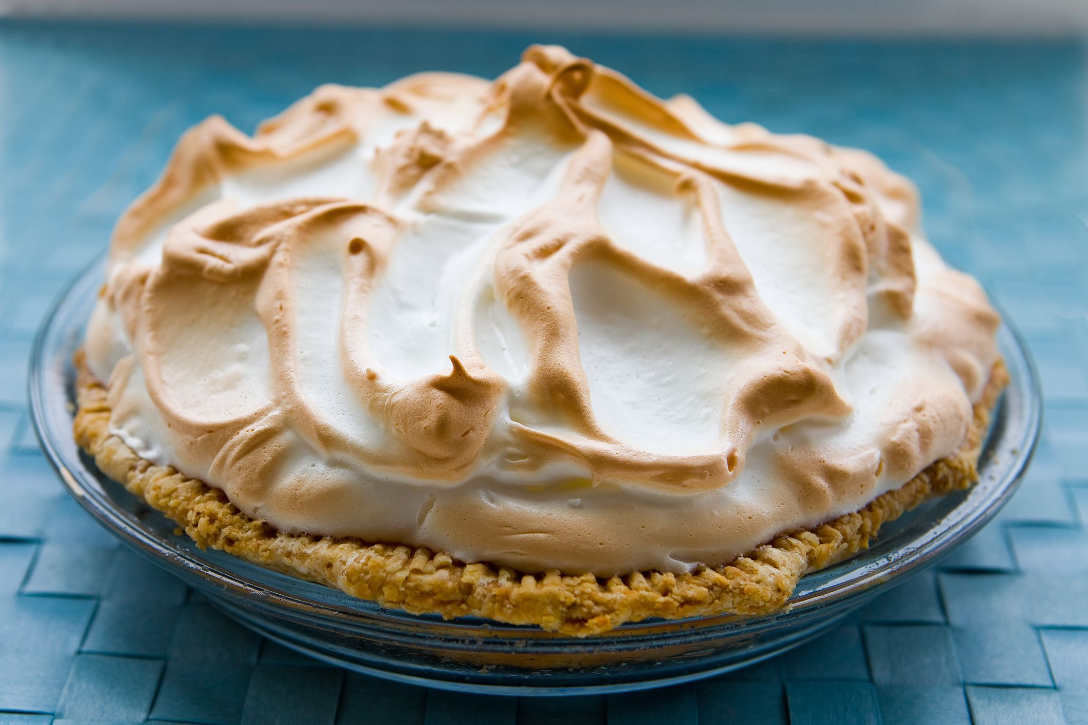 Key lime pie on a blue background.
