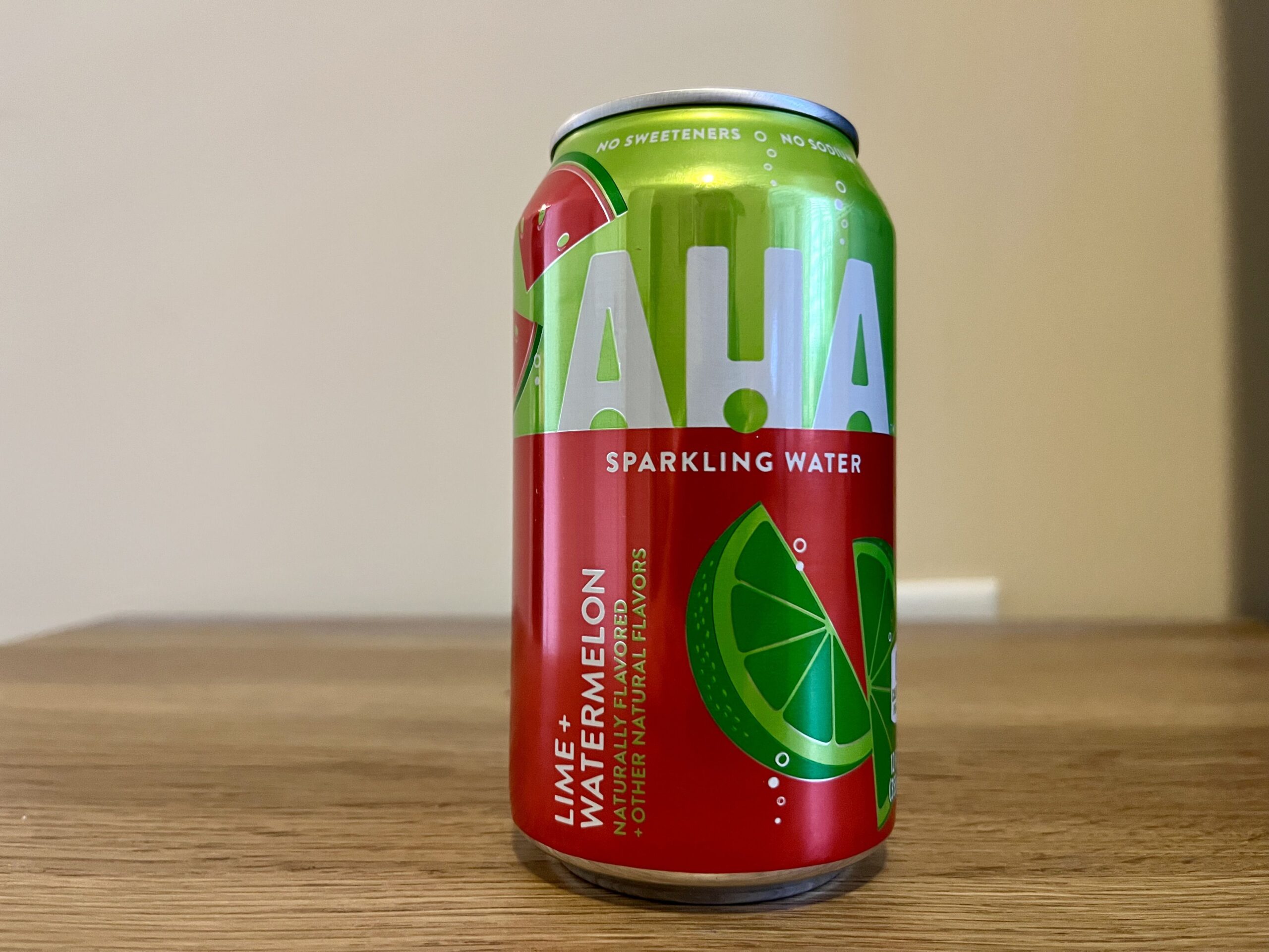 a can of lime watermelon aha sparkling water
