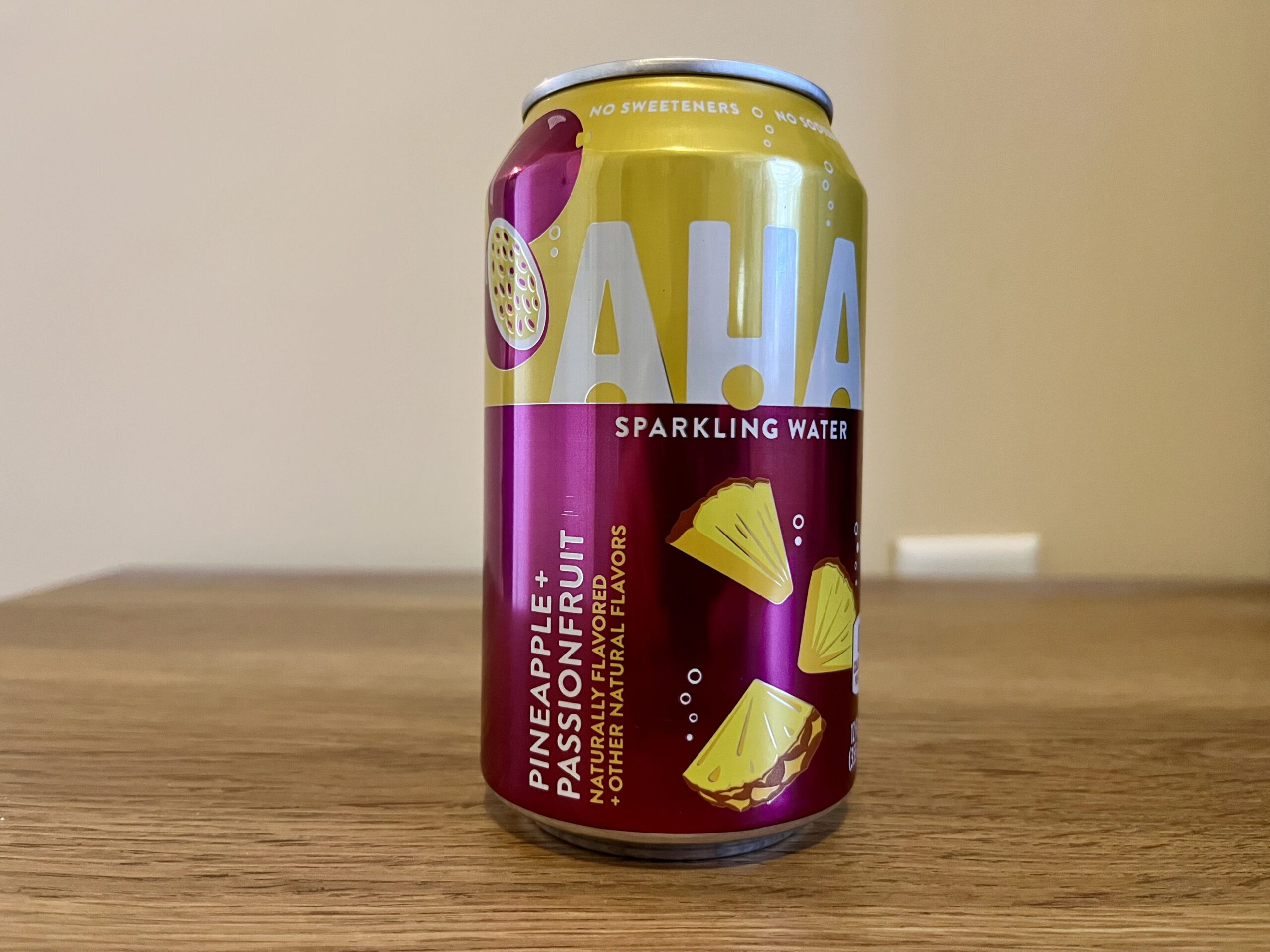 a can of pineapple passionfruit aha sparkling water