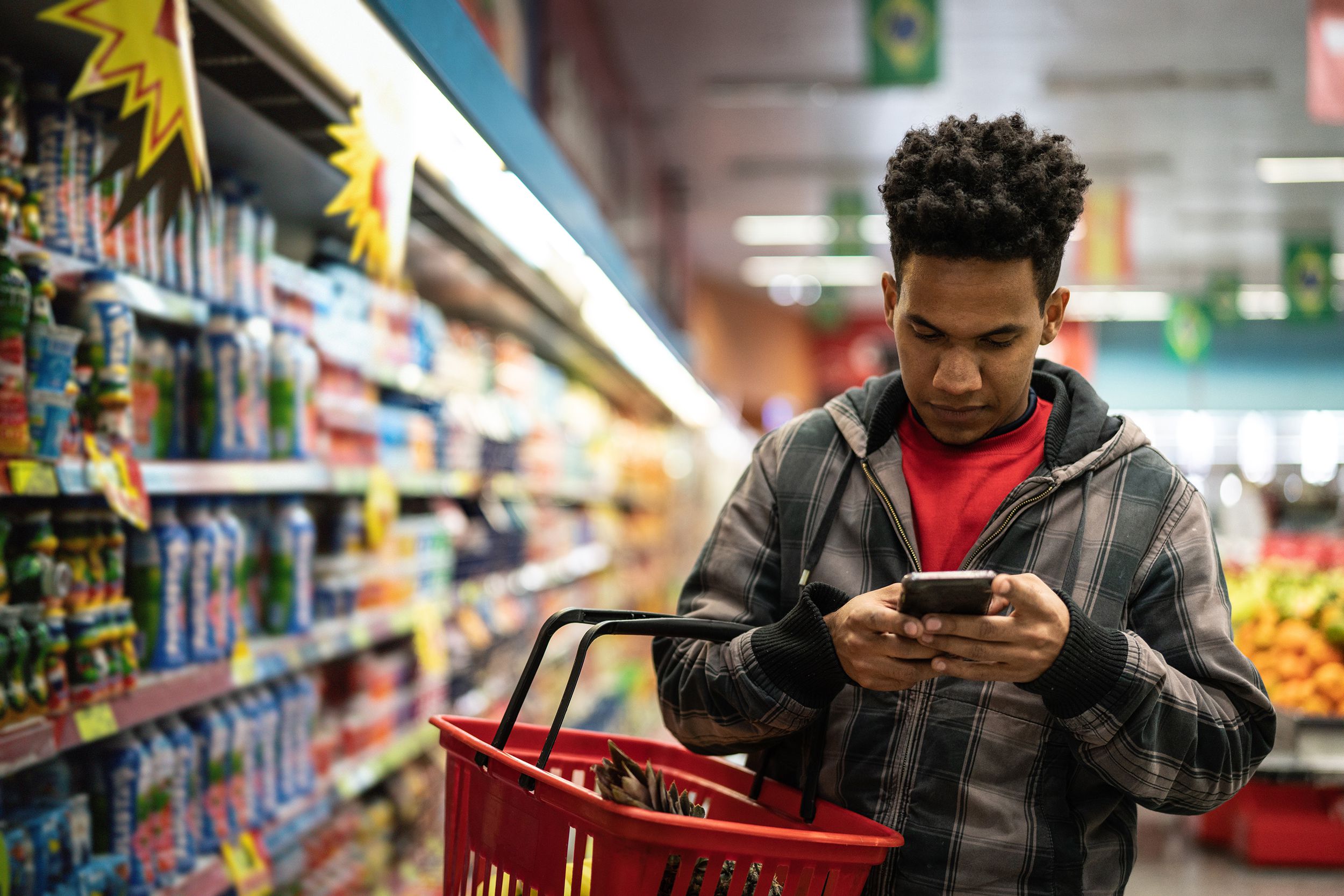 customer buying with mobile app on supermarket