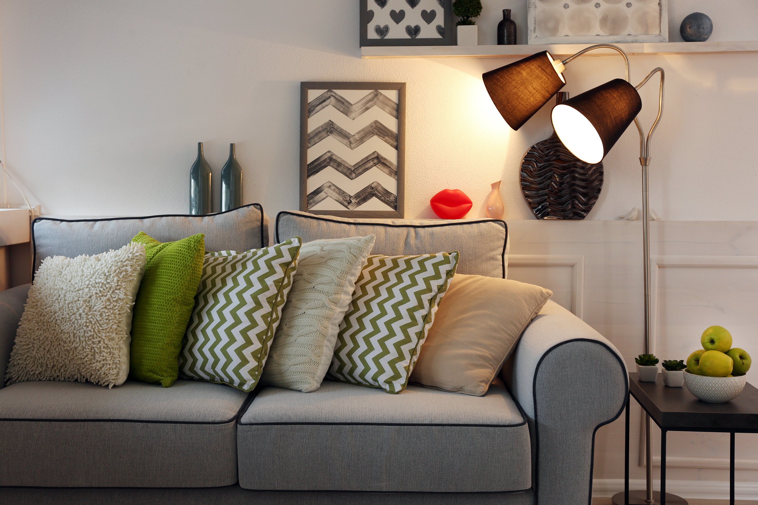 Empty living room with lamp on